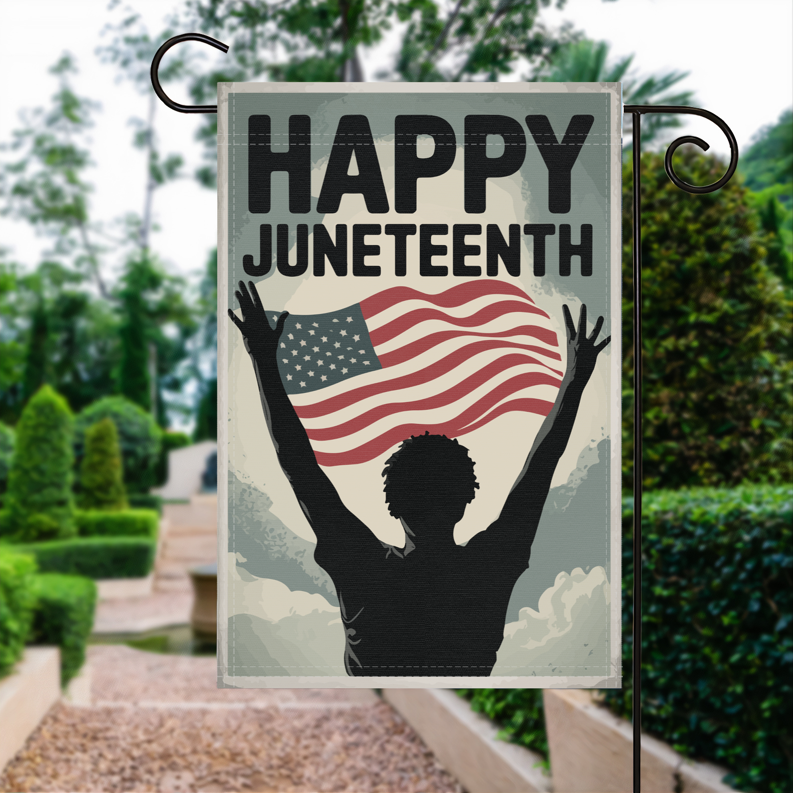 Happy Juneteenth garden flag made of weatherproof polyester displayed in a garden | Bannerfi