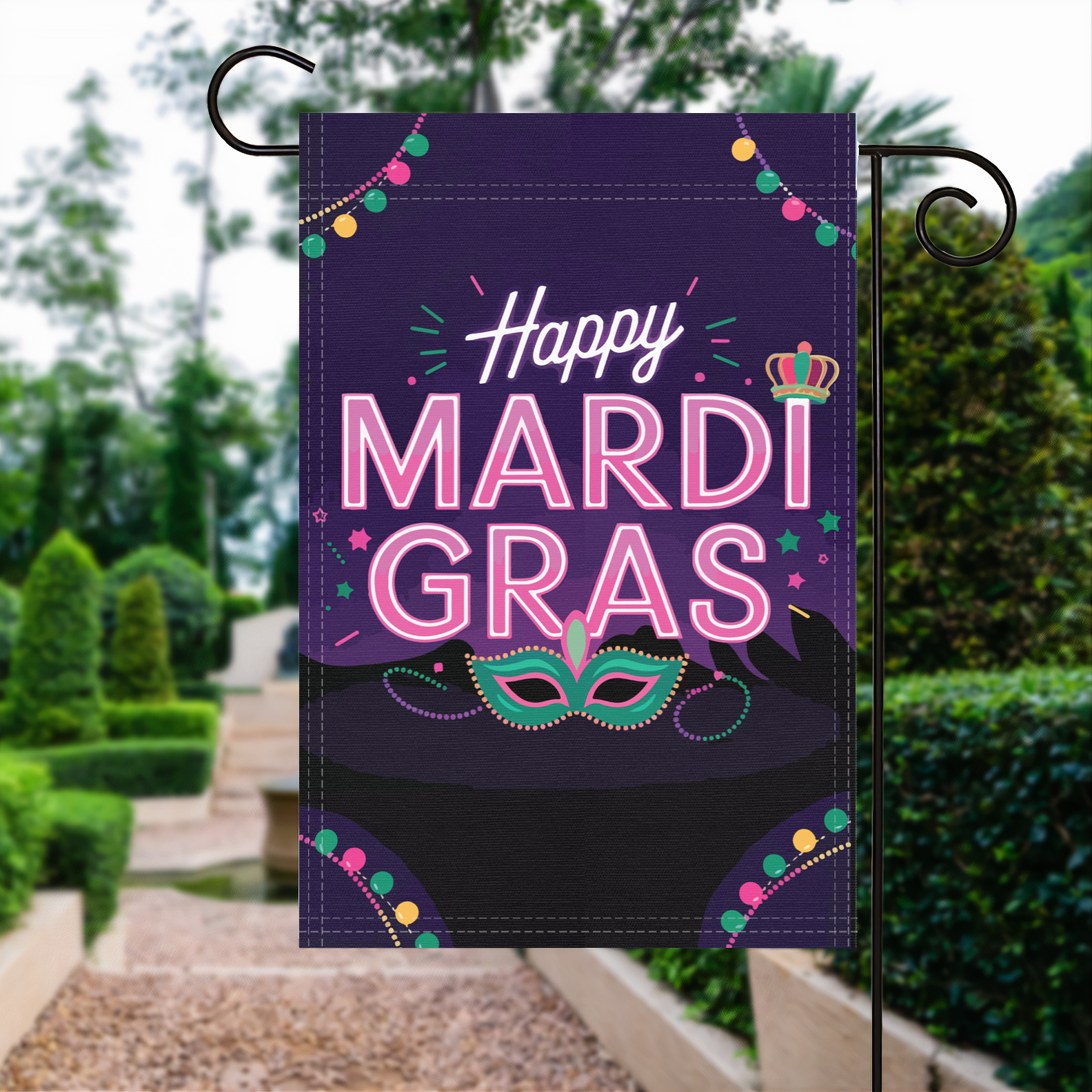 Happy Mardi Gras garden flag made of weatherproof polyester displayed in a garden | Bannerfi