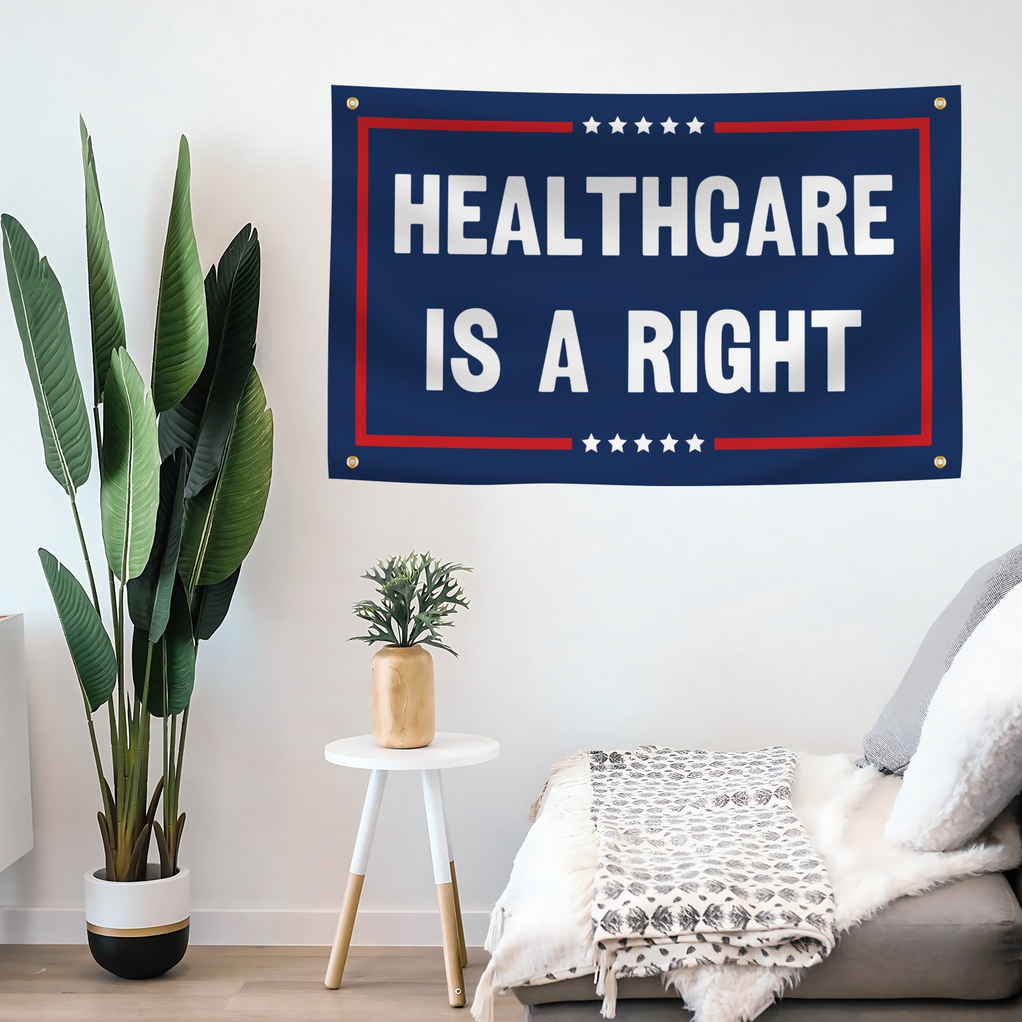 Flag banner with 'Healthcare is a Right' text and 4 grommets mounted on a wall. 