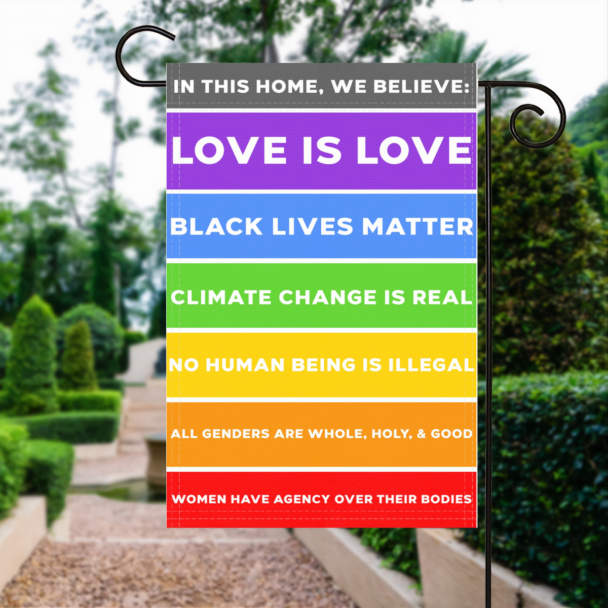 In This Home We Believe Garden Flag