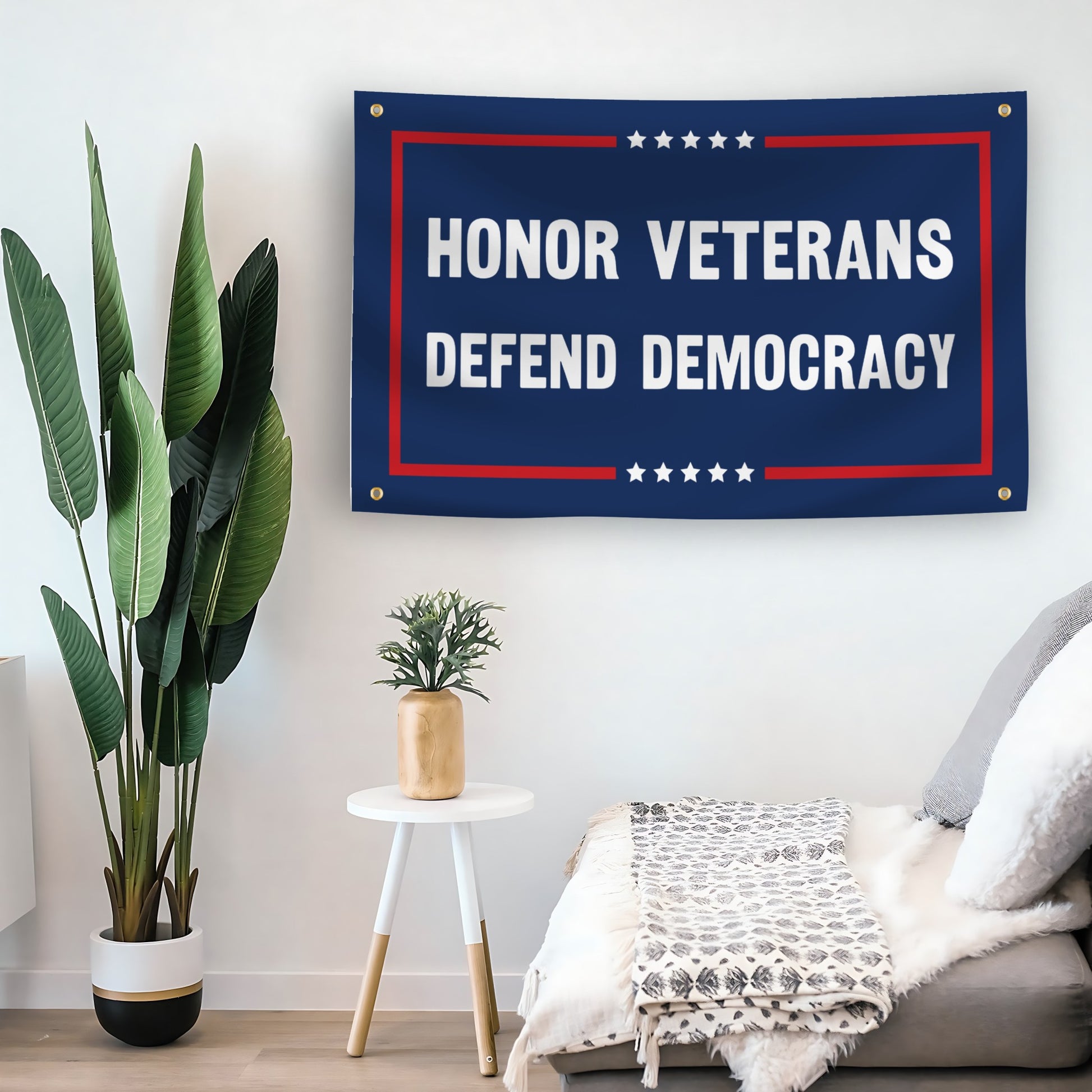 Living room with a 'Honor Veterans Defend Democracy' flag banner on the wall.