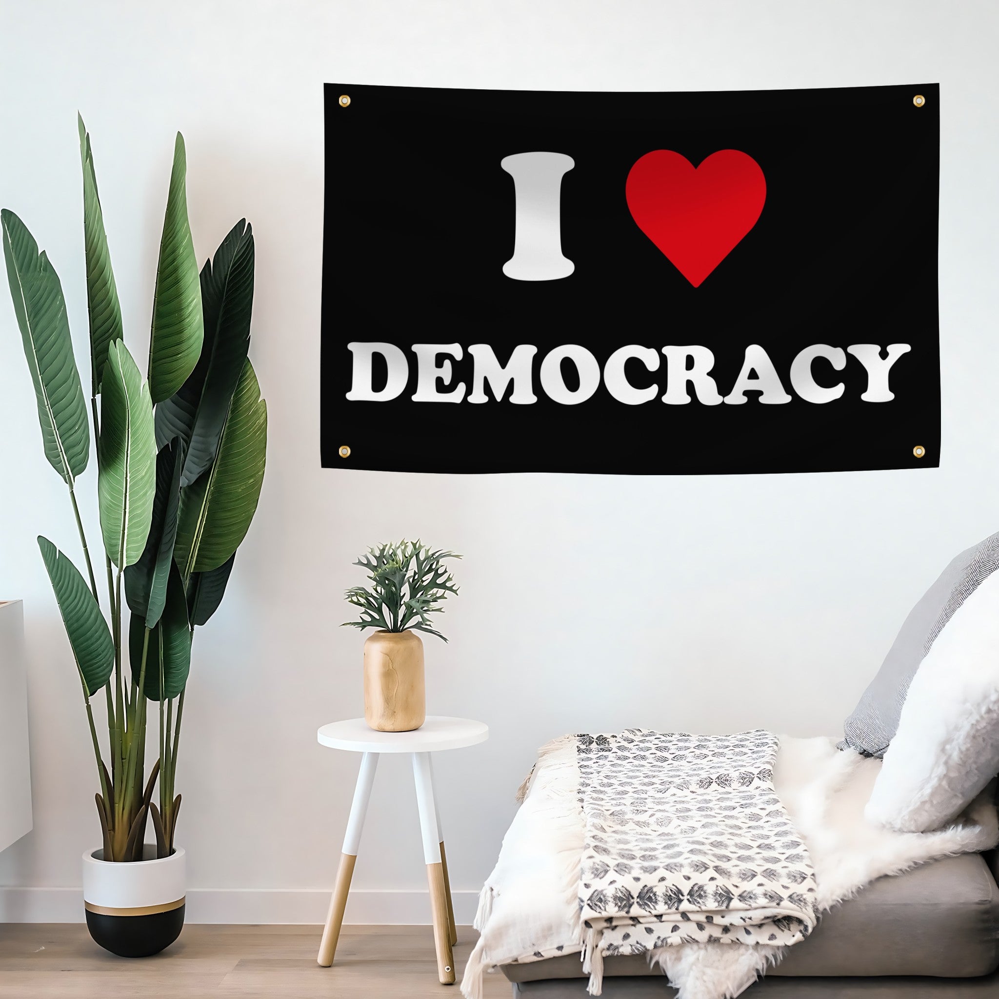 Flag with 'I ❤️ DEMOCRACY' text in a room with plants and furniture.