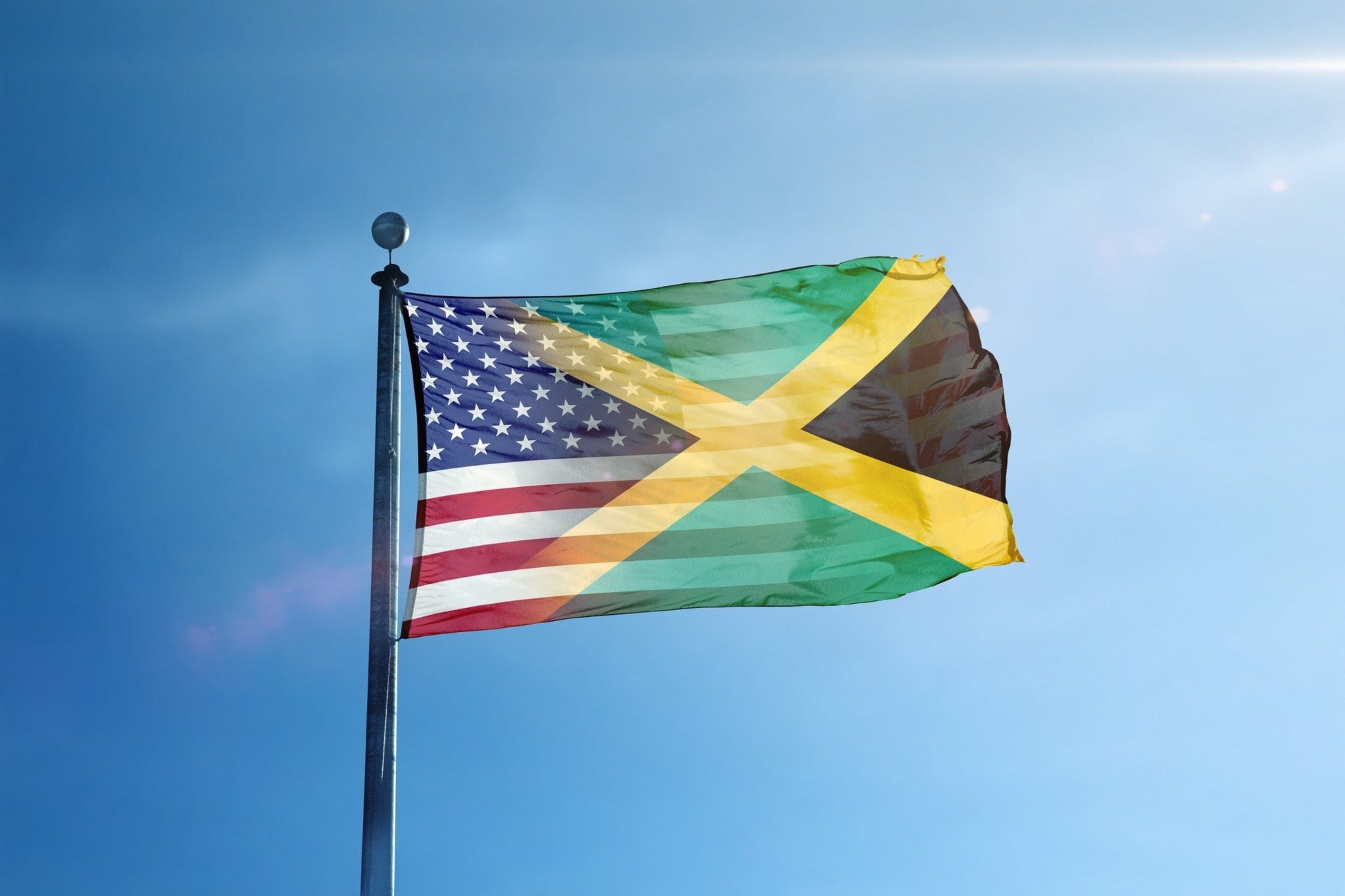 a flag flying in the wind on a sunny day