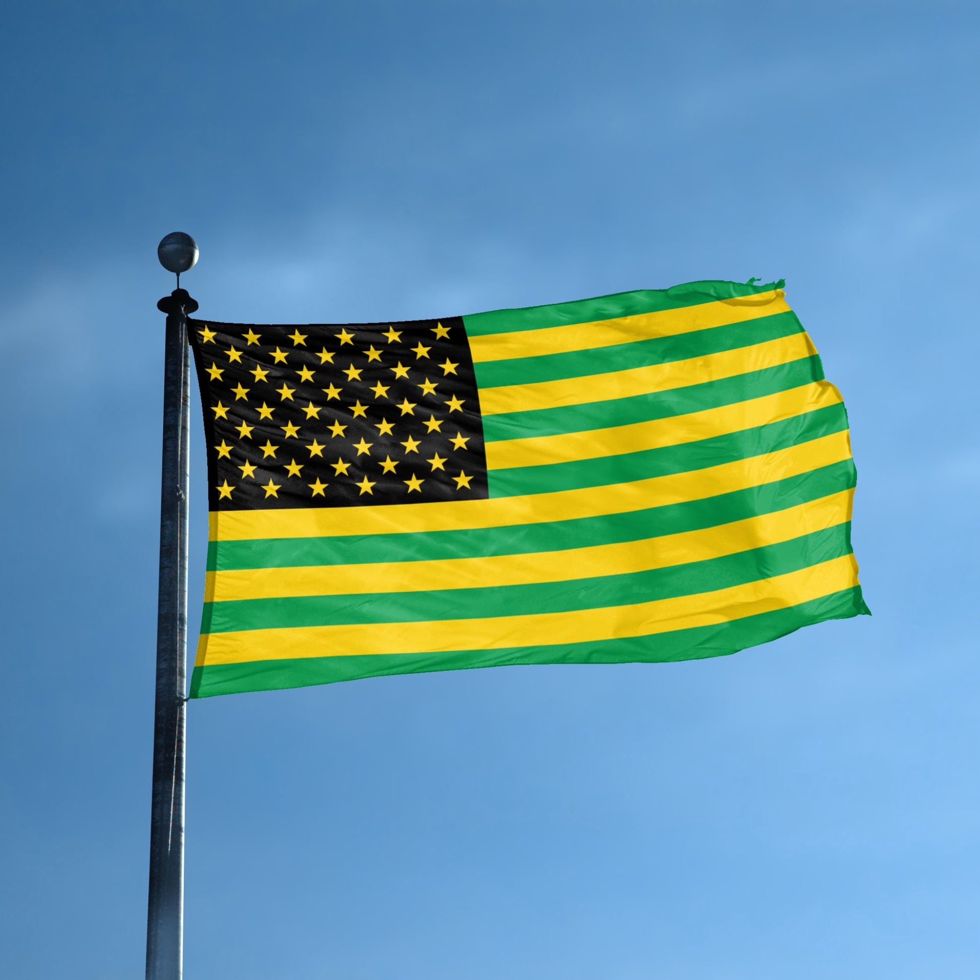 A flag with the theme "Jamaican Colors American" displayed on a tall flag pole and blue skies.