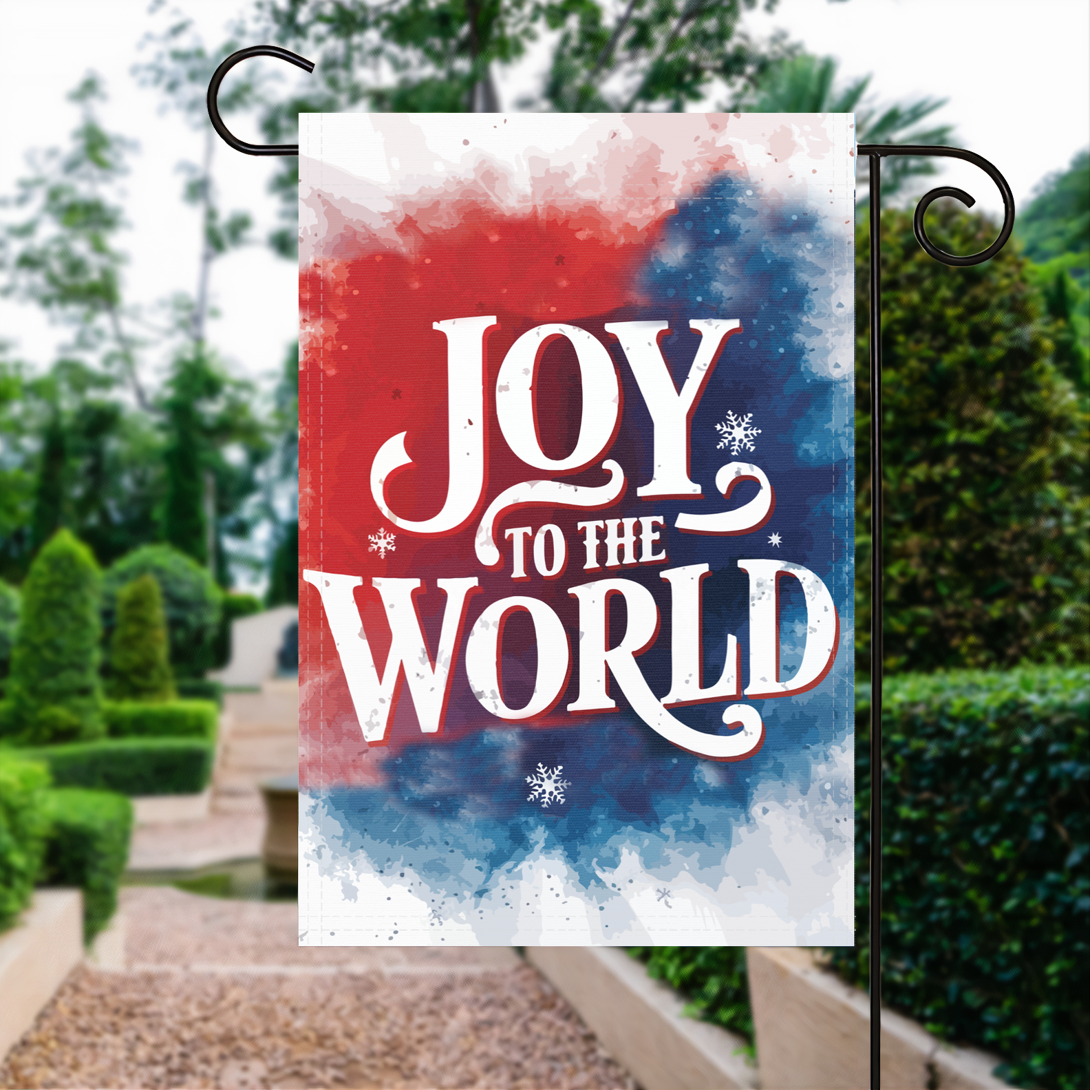 Joy To The World garden flag made of weatherproof polyester displayed in a garden | Bannerfi