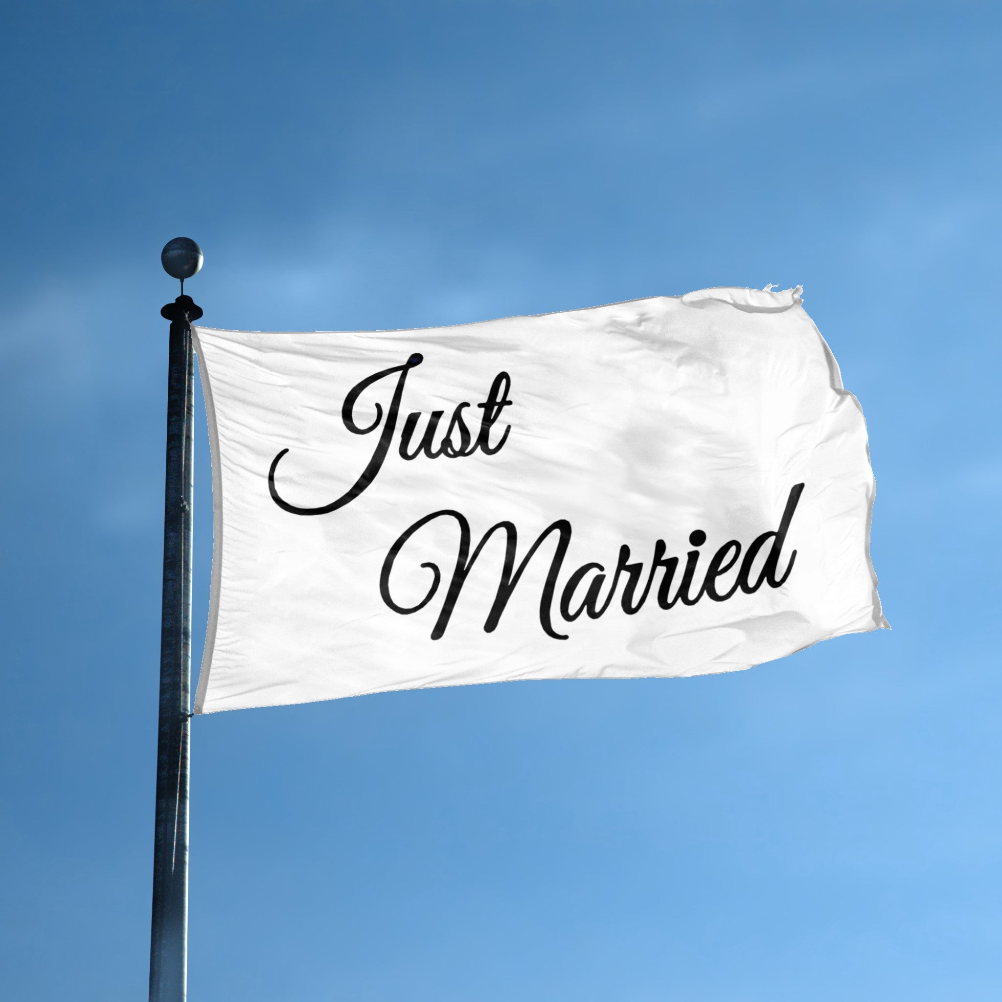 A flag with the theme "Just Married White" displayed on a tall flag pole and blue skies.