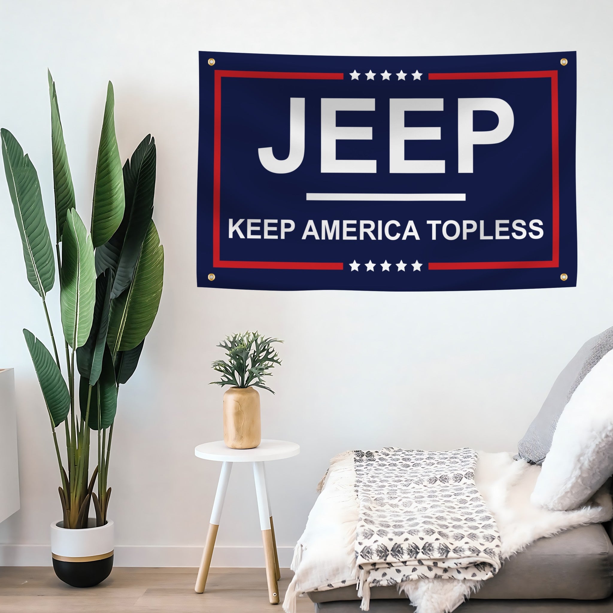 Jeep-themed flag banner with 'Keep America Topless' text on a wall in a living room setting.