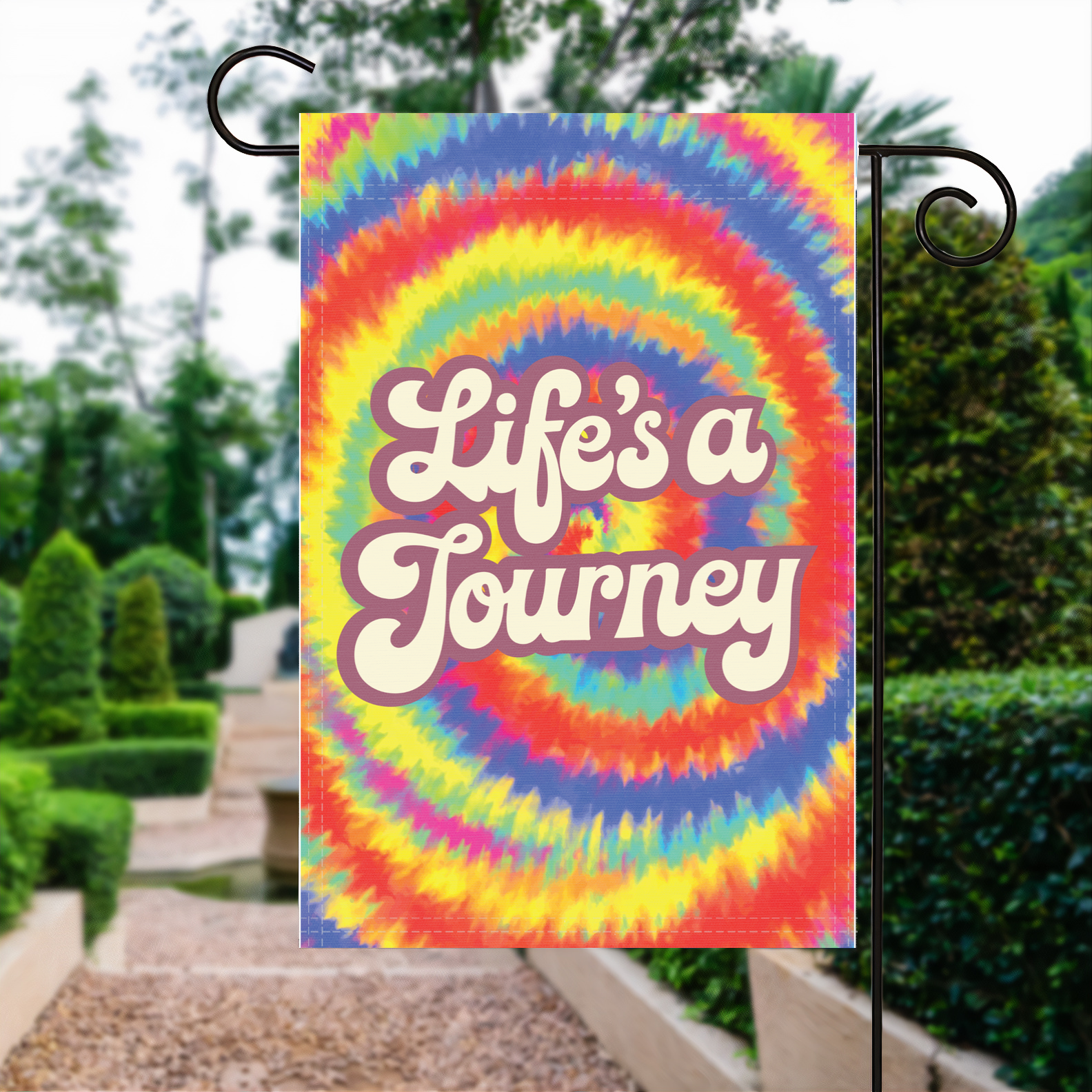 Life's A Journey garden flag made of weatherproof polyester displayed in a garden | Bannerfi