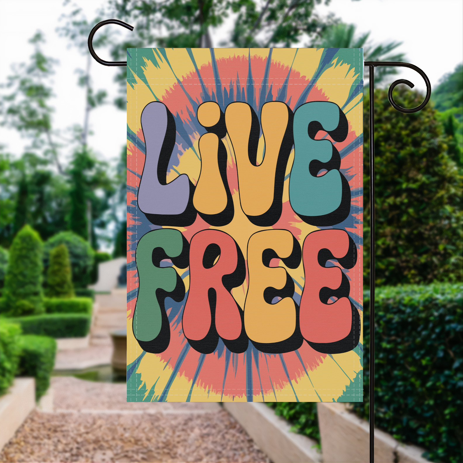 Live Free garden flag made of weatherproof polyester displayed in a garden | Bannerfi