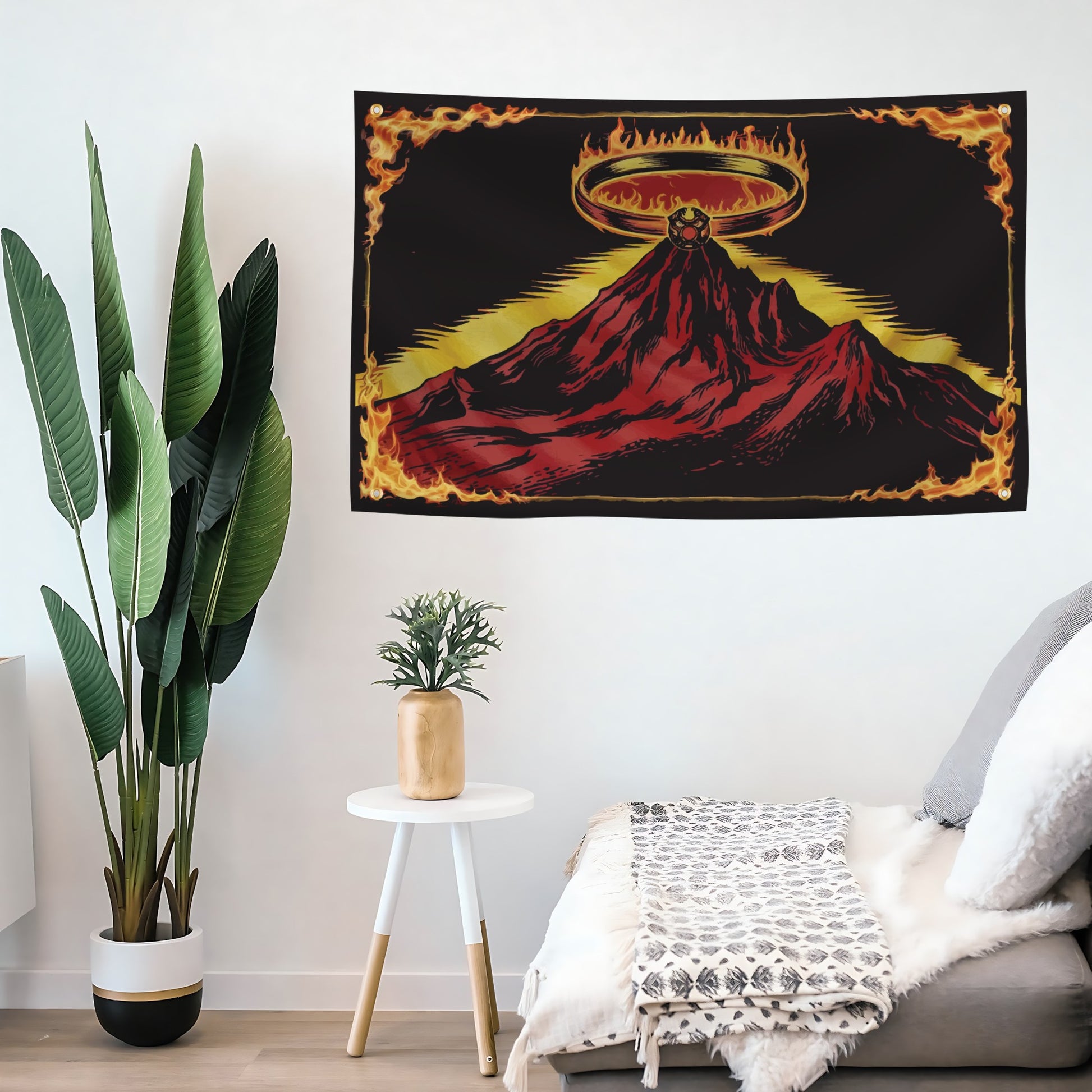 LOTR flag banner on a wall with the mount doom mountain and flaming ring halo design on a black background.