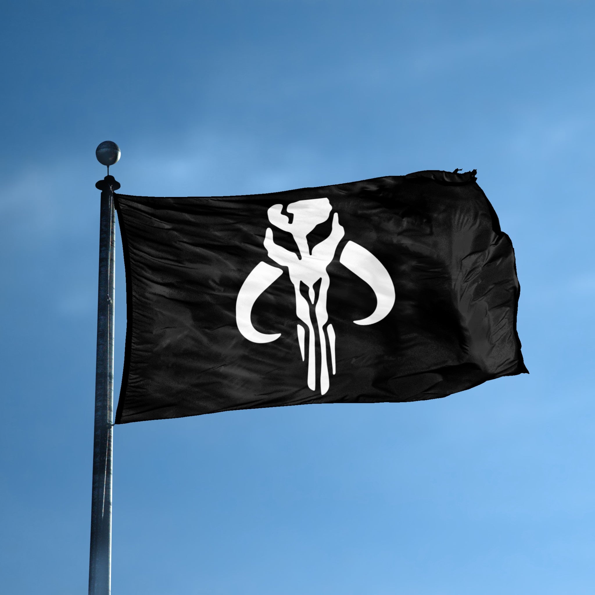 A flag with the theme "Star Wars Mandalorian Mythosaur Skull" displayed on a tall flag pole and blue skies.