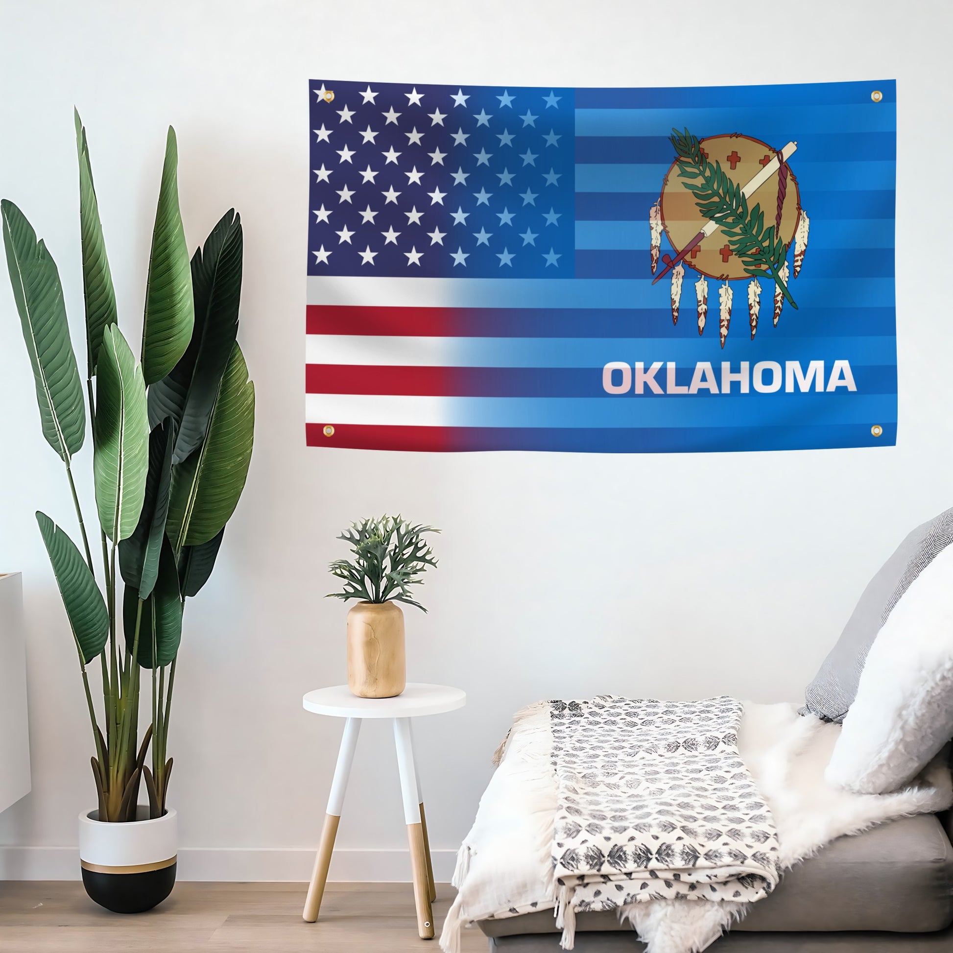 American flag with Oklahoma design hanging on a wall above a sofa.