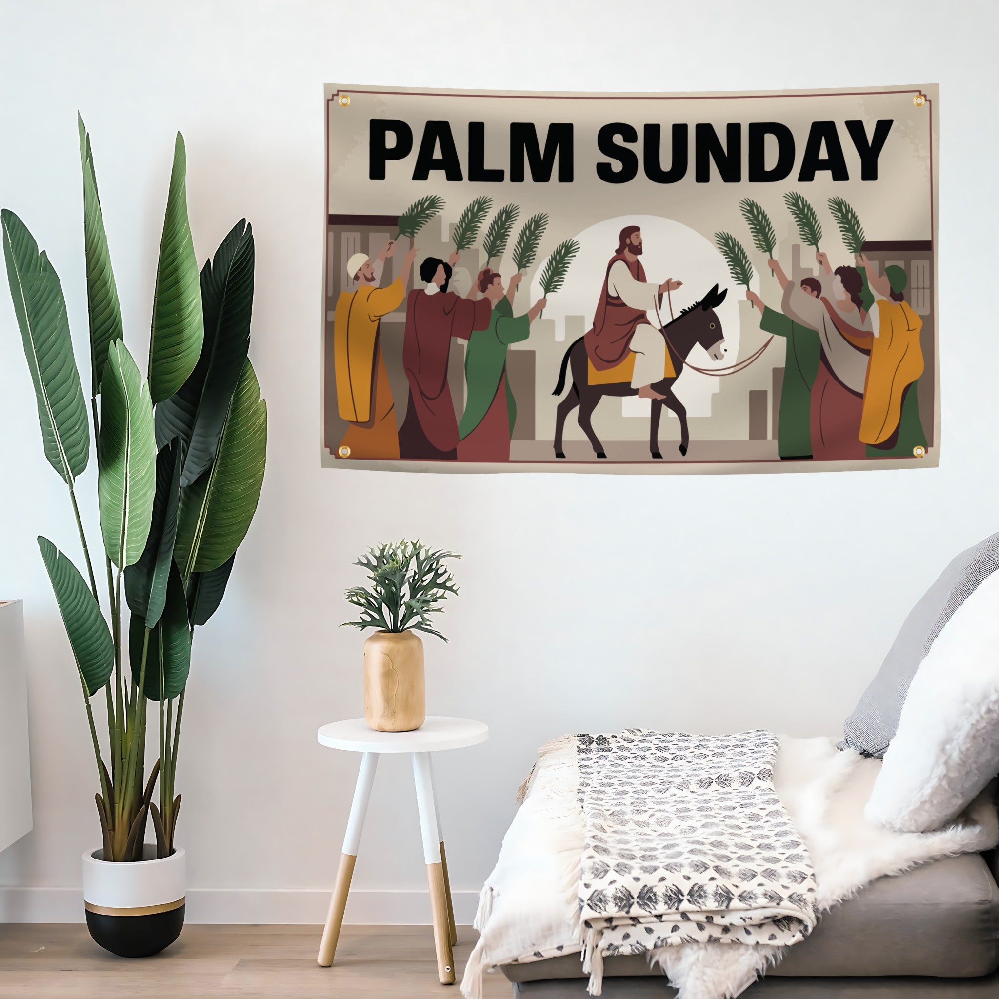 Palm Sunday flag banner on a wall with plants and a table in the foreground.