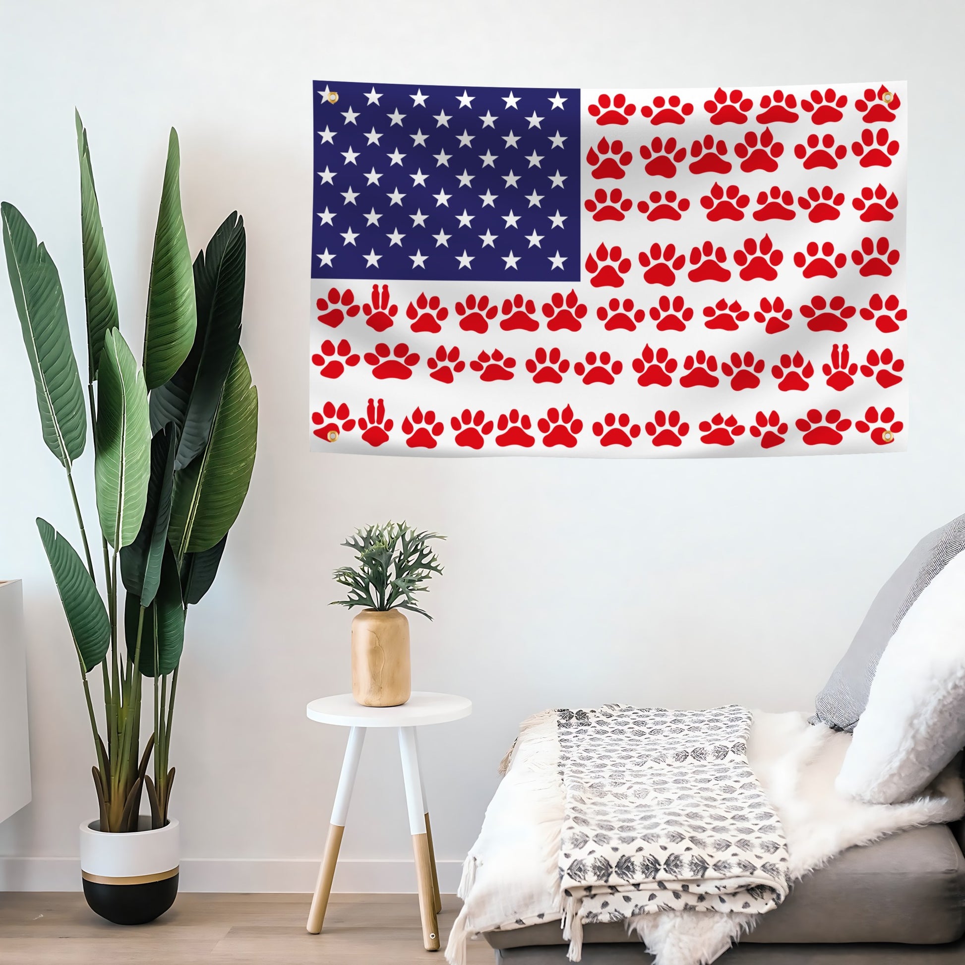 American flag banner with red paw prints on a wall in a living room setting.