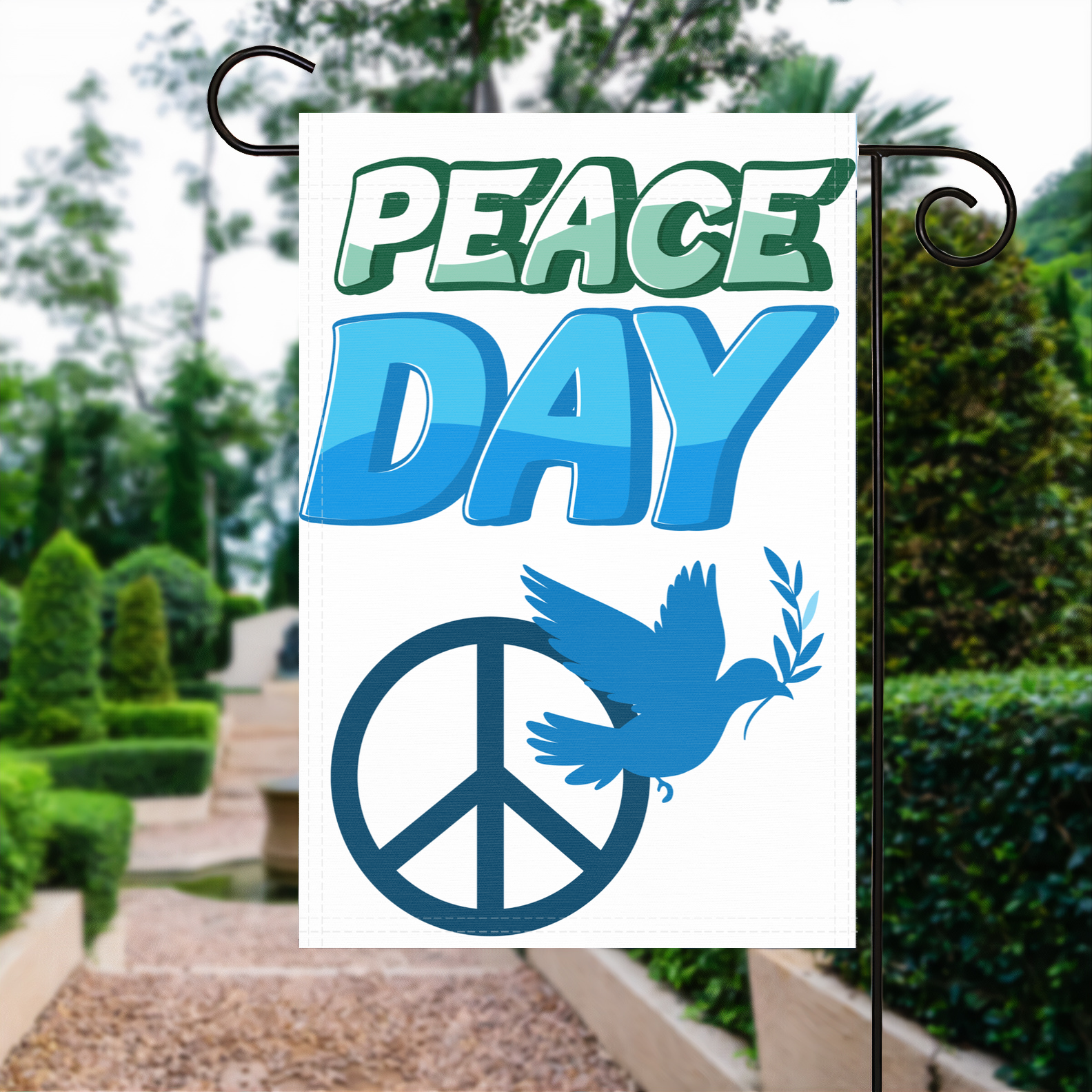 Peace Day garden flag made of weatherproof polyester displayed in a garden | Bannerfi