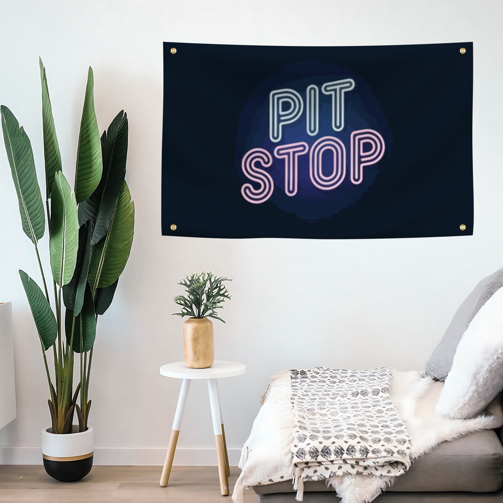 Pit Stop Flag banner in neon colors with 4 grommets mounted on a wall.