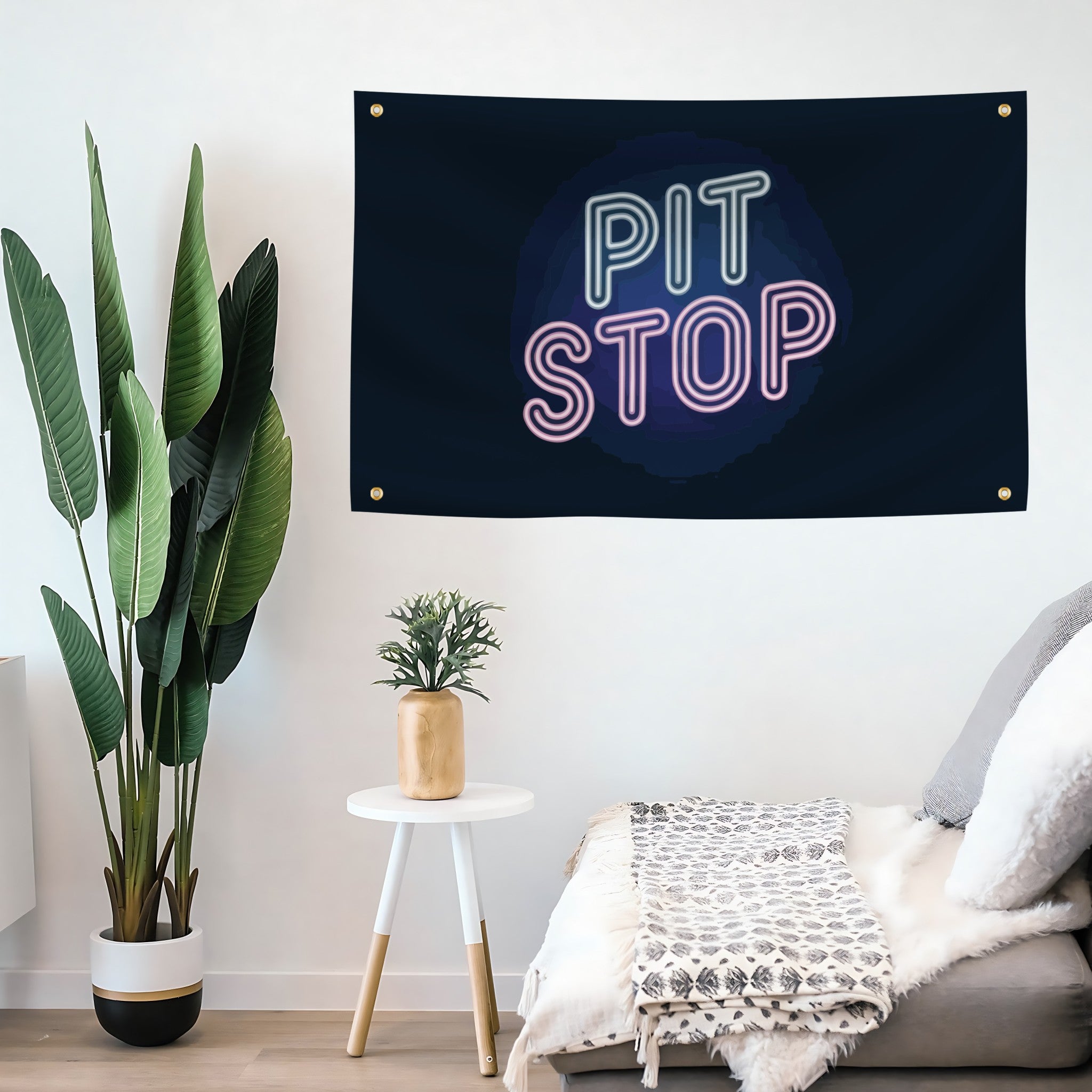 Pit Stop Flag banner in neon colors with 4 grommets mounted on a wall.