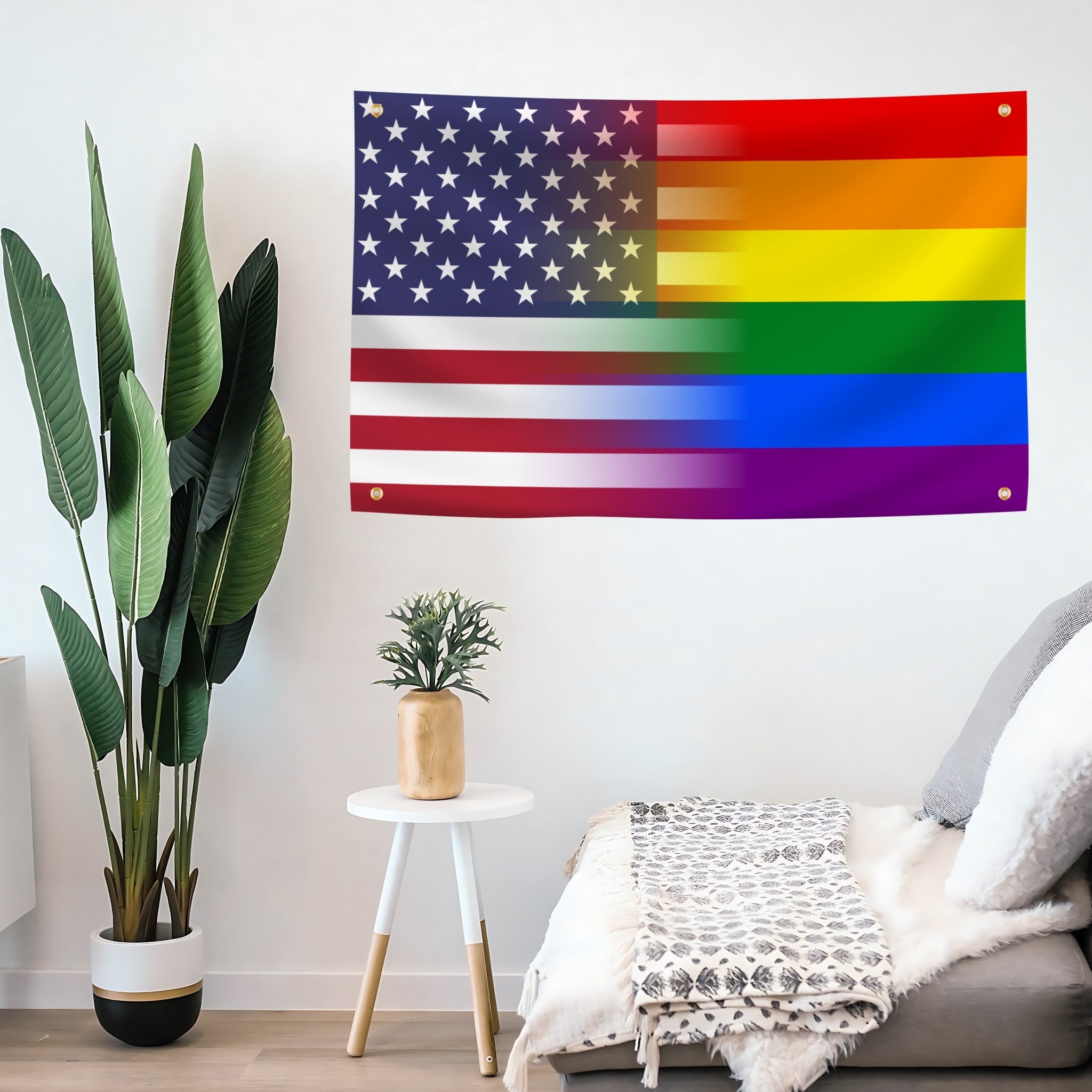 An American flag banner blended with rainbow pride stripes mounted on a living room wall.