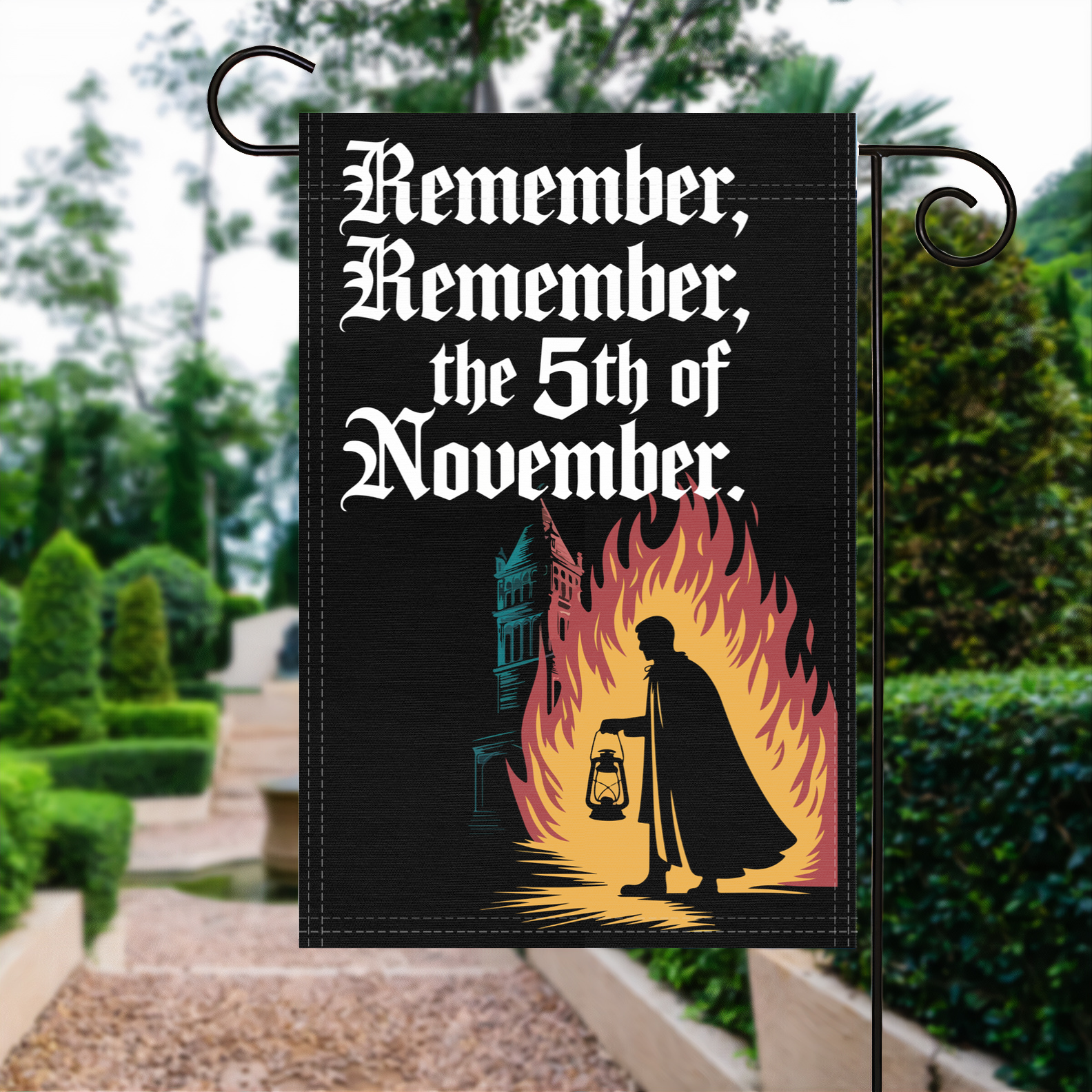 Remember Remember The 5th Of November garden flag made of weatherproof polyester displayed in a garden | Bannerfi