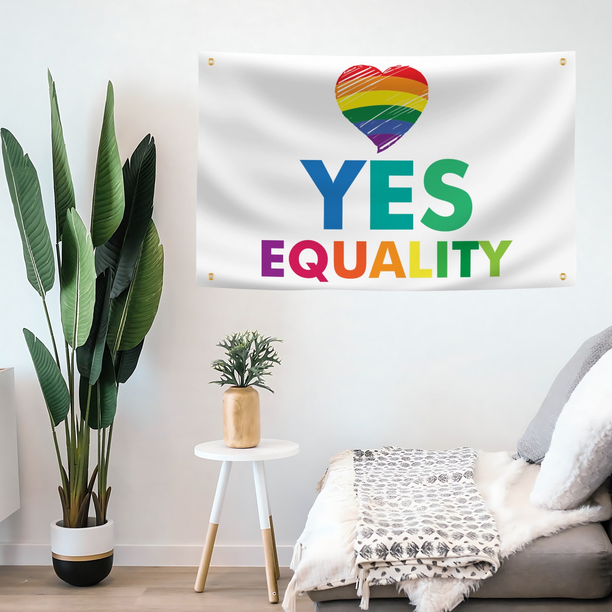 Room interior with a 'YES EQUALITY' flag banner featuring a rainbow heart, plants, and a small table.