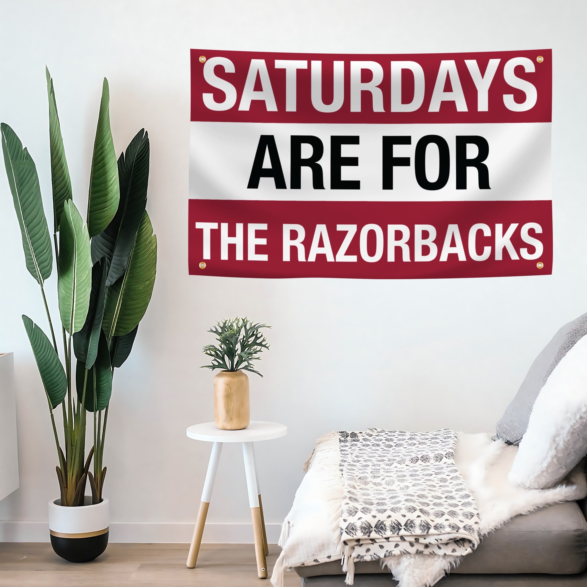 Decorative flag banner with 'Saturdays are for the Razorbacks' text in a living room setting.