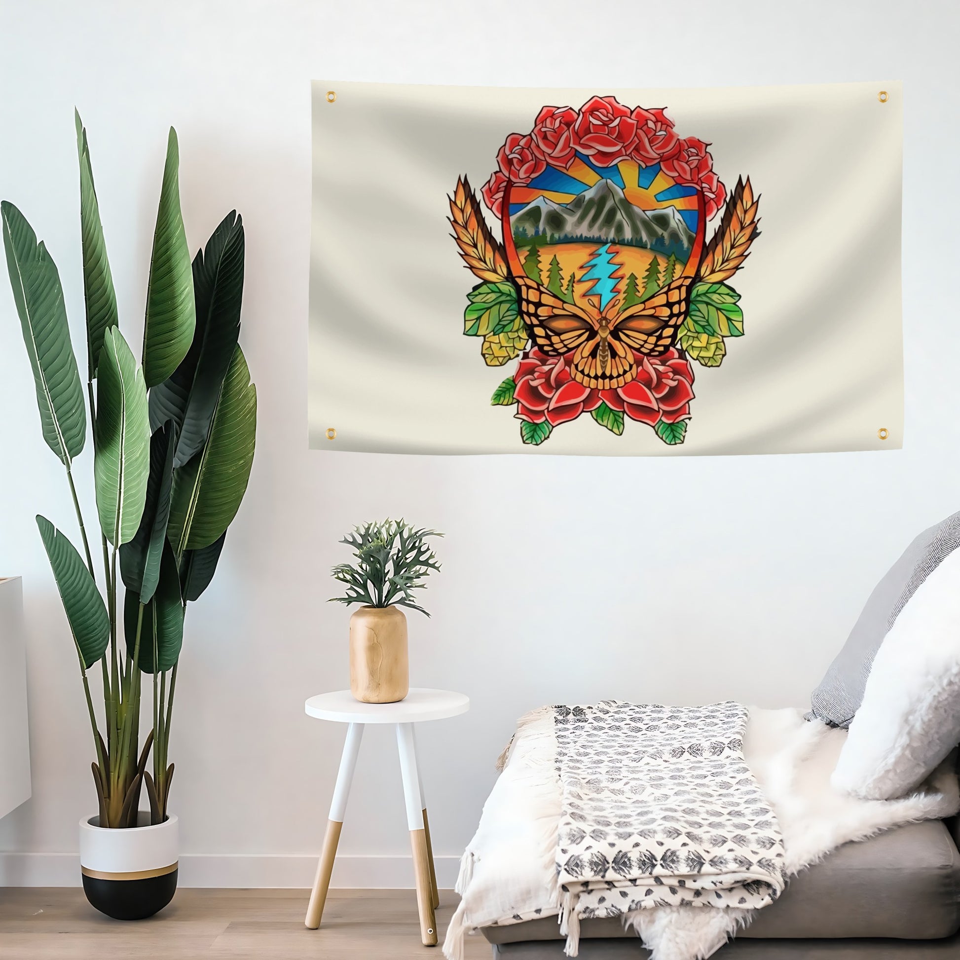 grateful dead skull wall banner with a colorful design of a butterfly, roses, and mountains in a living room.