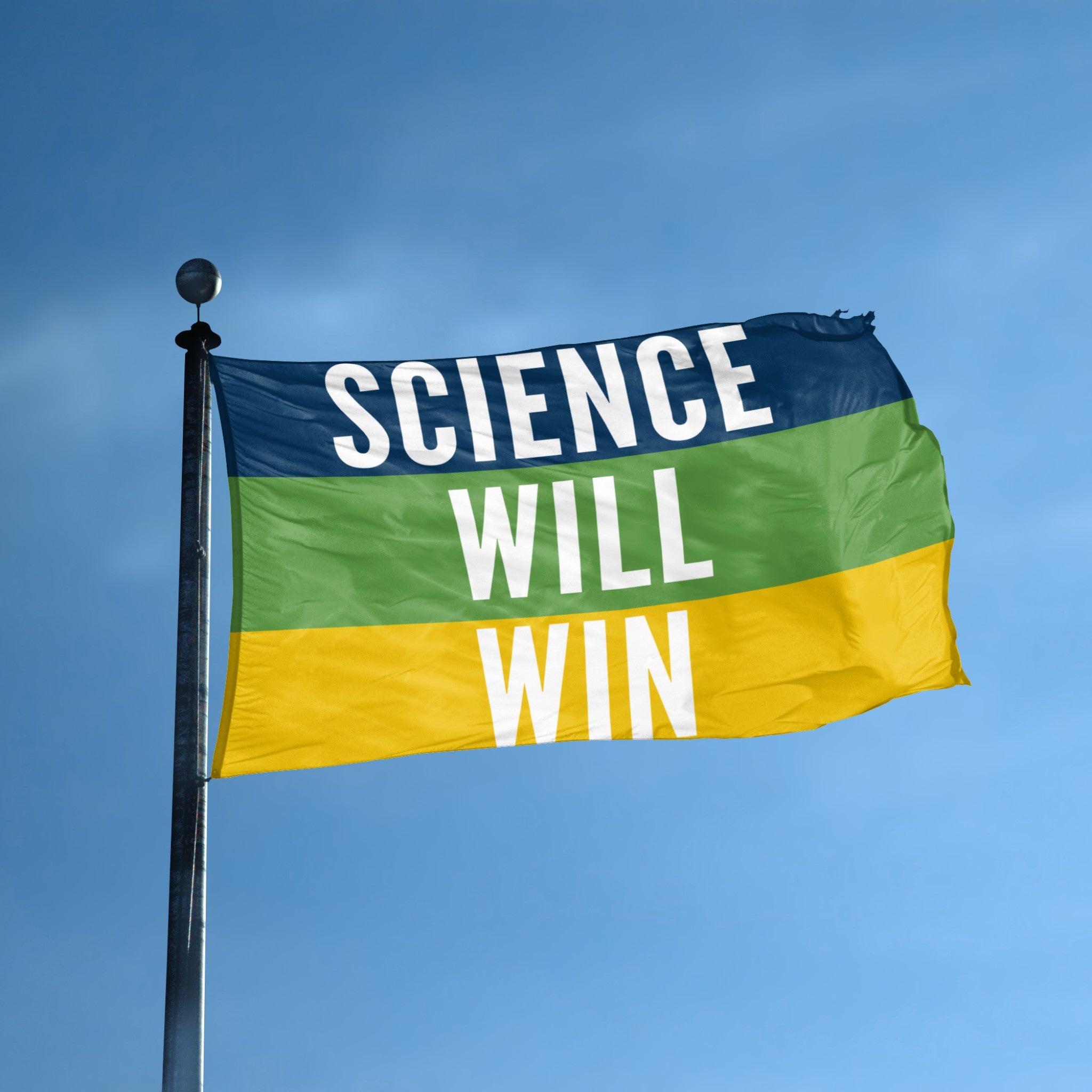 Flag on a pole with 'Science Will Win' text against a blue sky
