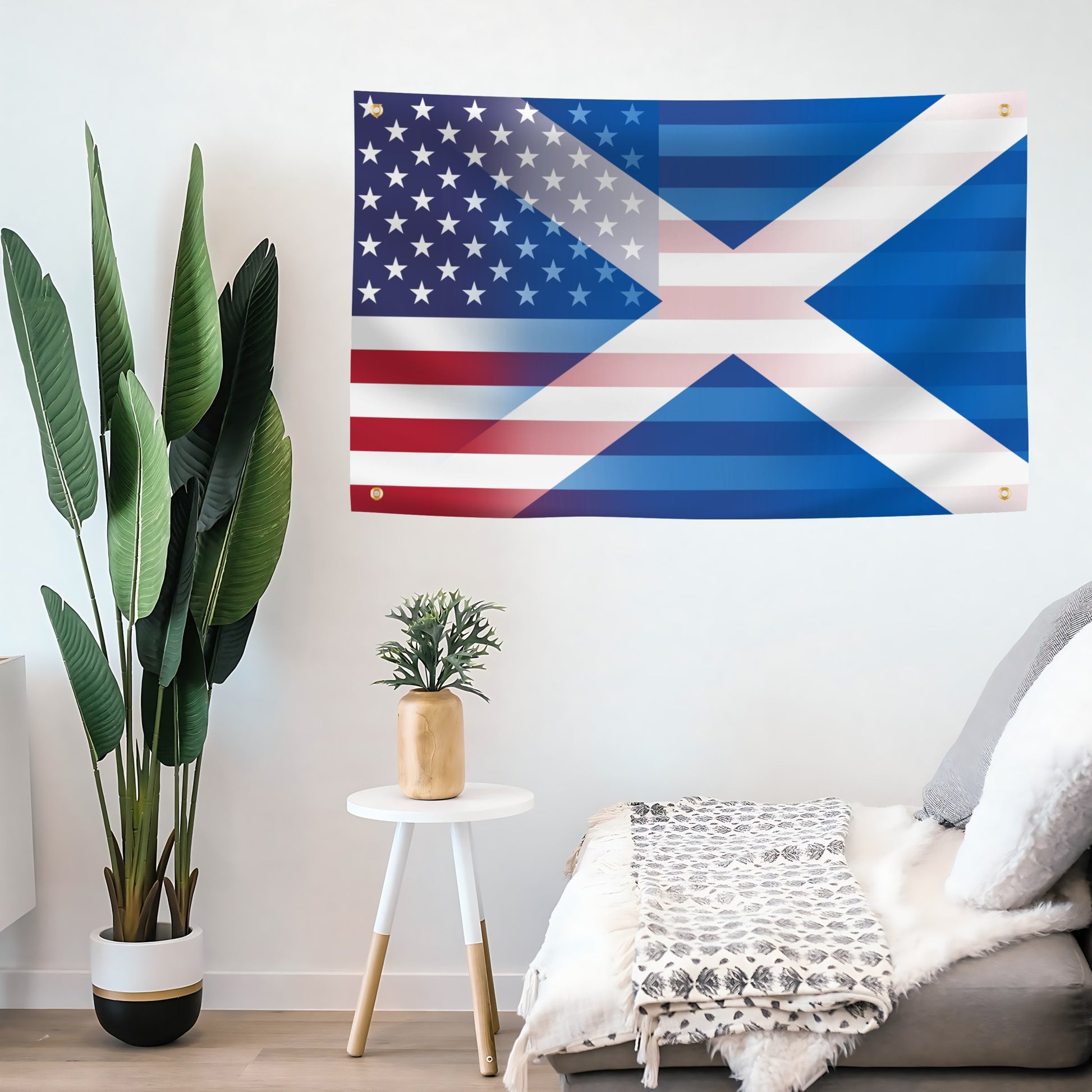Living room with a large flag banner of the United States and Scotland designs blended together on the wall, a plant, and a small table.
