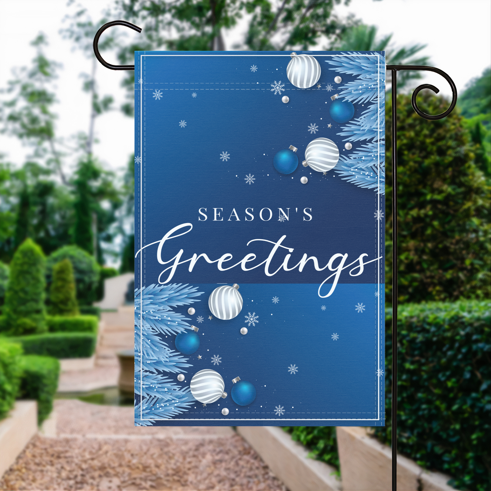 Season's Greetings Winter garden flag made of weatherproof polyester displayed in a garden | Bannerfi