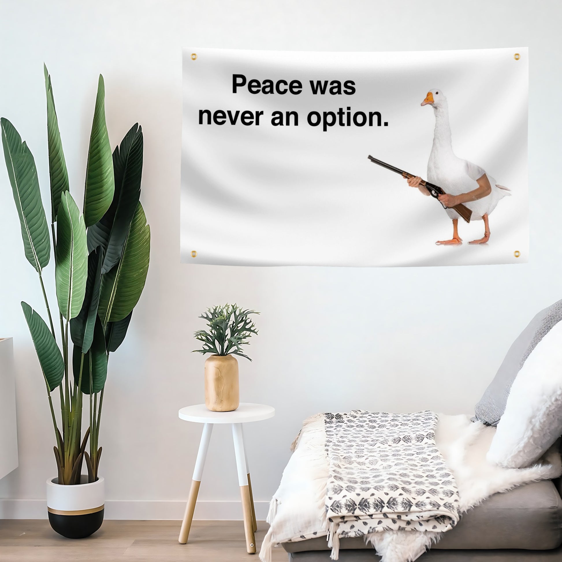 Room interior with a wall flag banner featuring a goose with a gun and text 'Peace was never an option.'