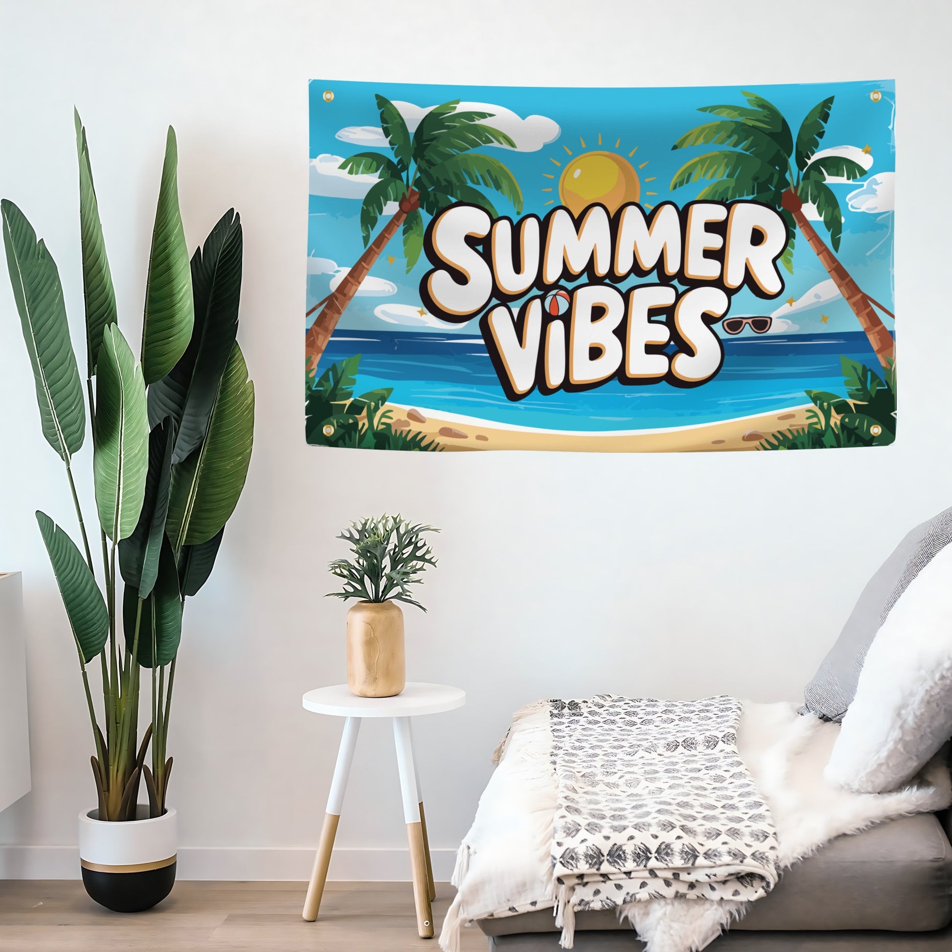 Decorative banner with 'Summer Vibes' text hanging on a wall above a sofa.
