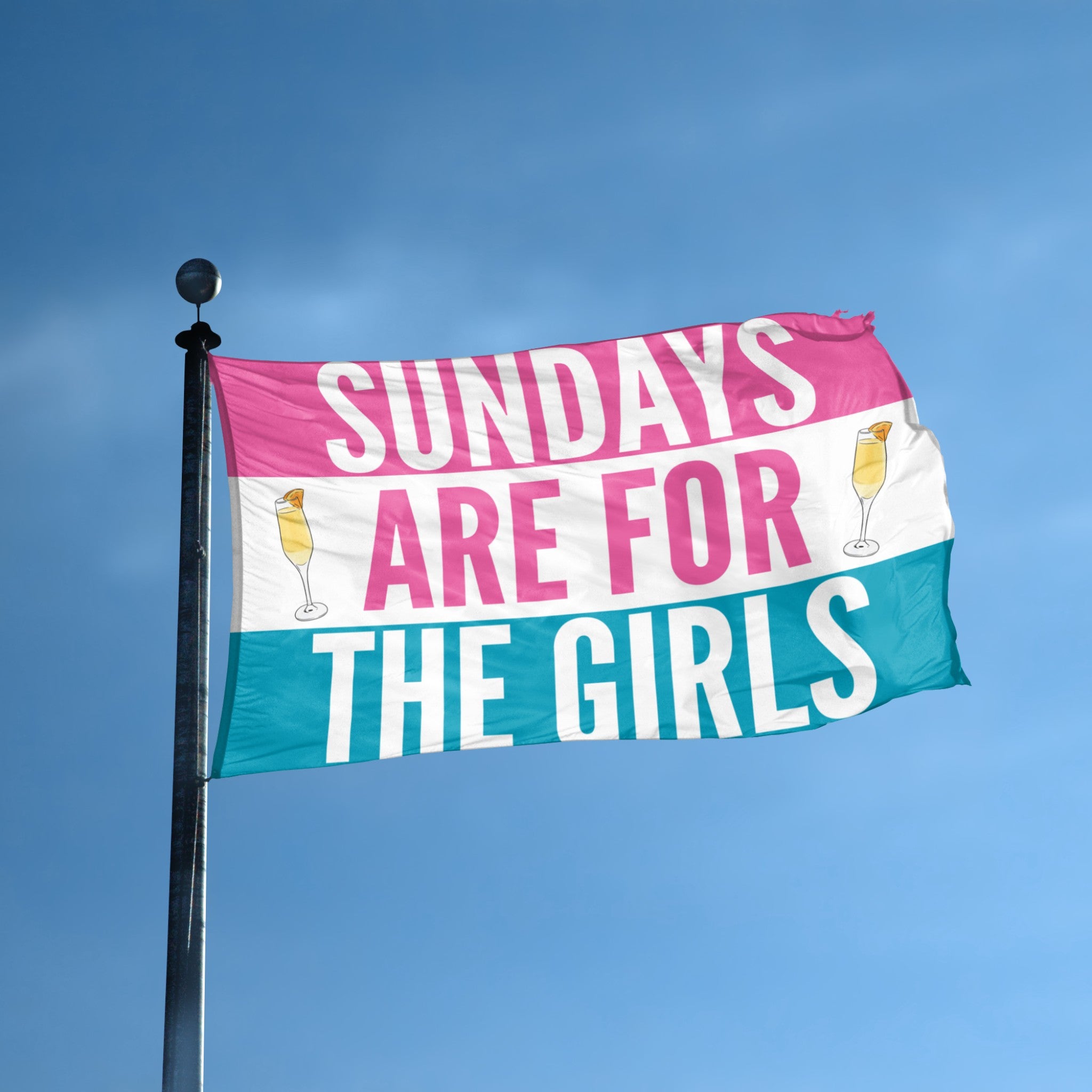 Flag with 'Sundays are for the Girls' text on a flagpole against a blue sky