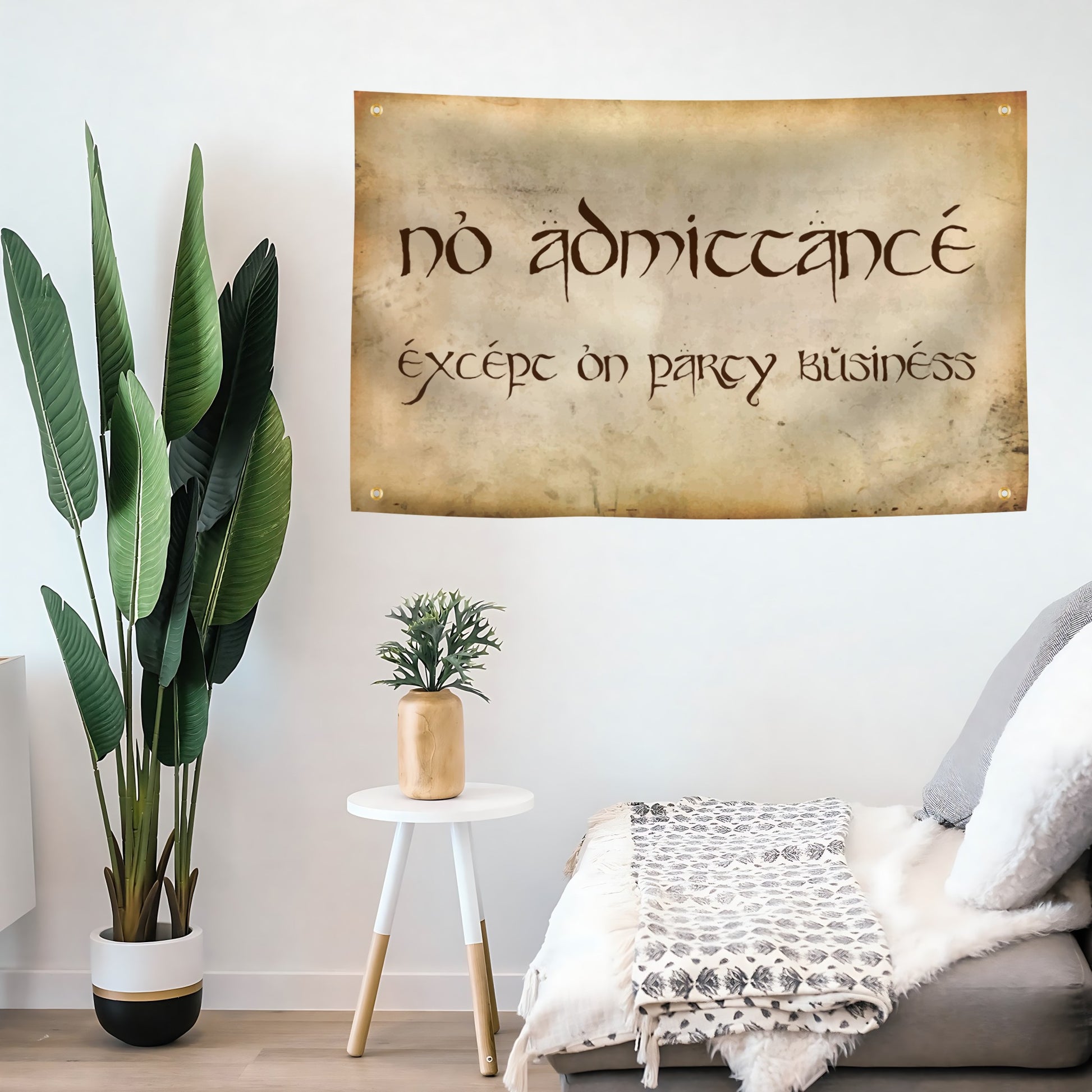 Vintage-style flag banner with the text "no admittance except on party business" on a living room wall.