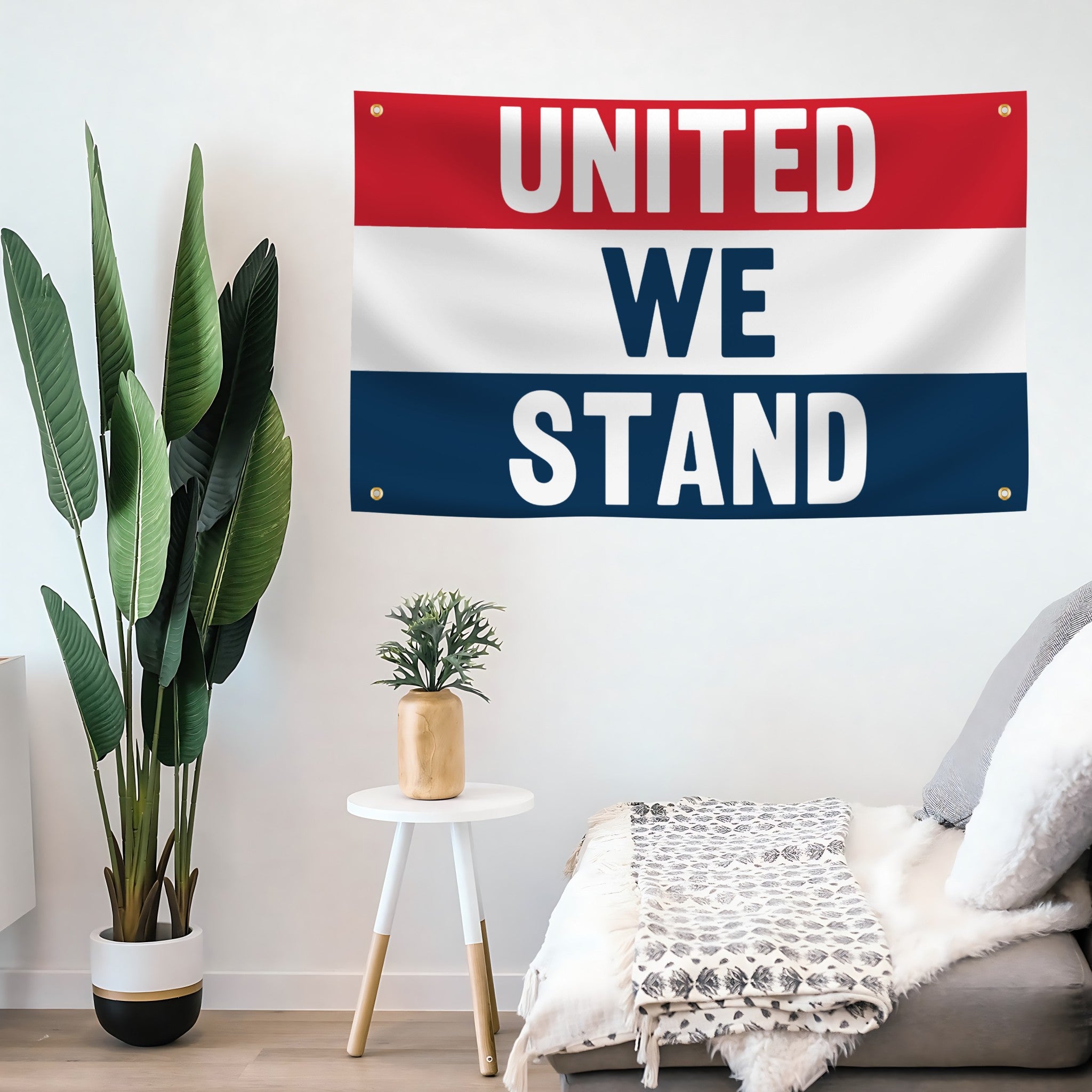 Decorative flag banner with 'UNITED WE STAND' text in a living room setting.