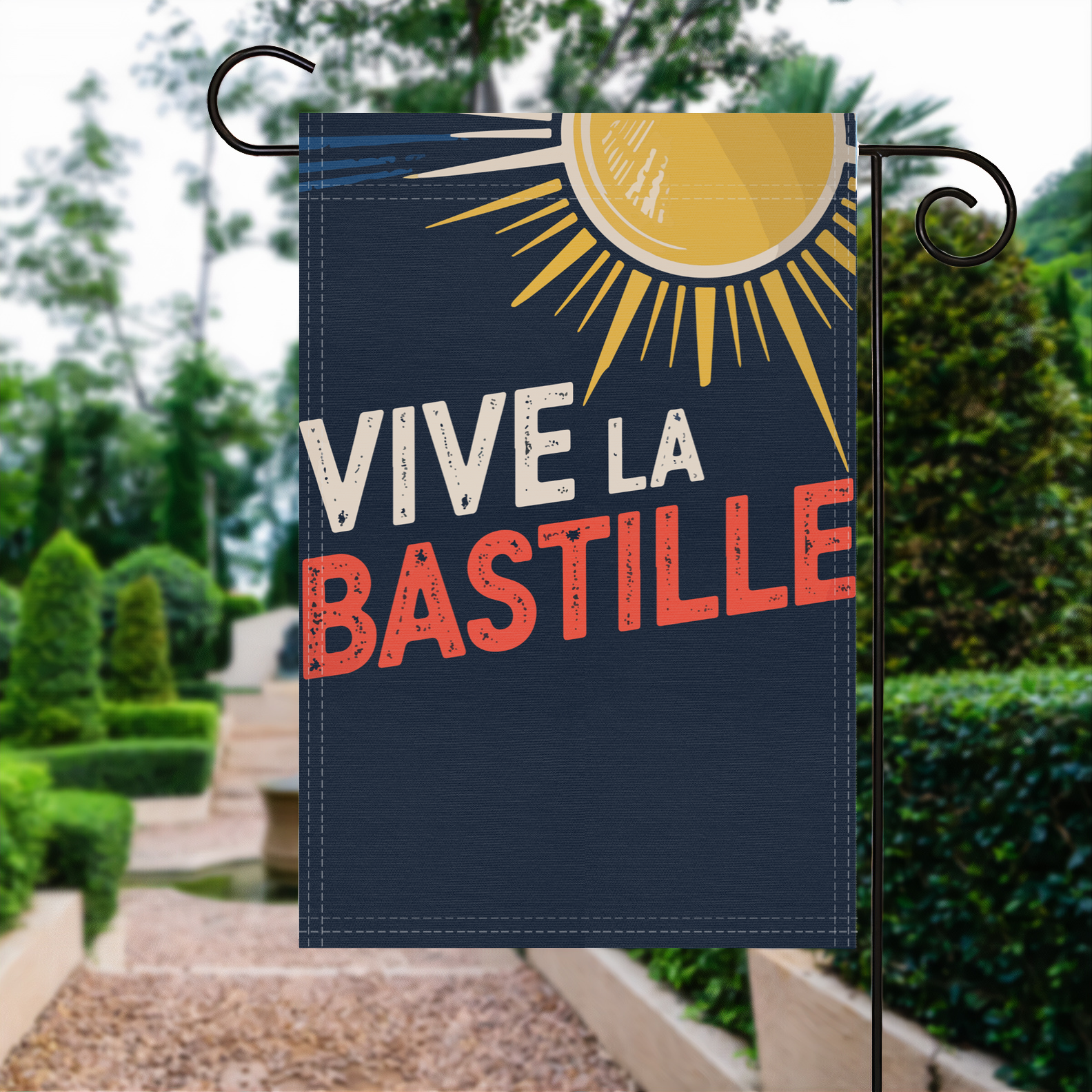 Vive La Bastille garden flag made of weatherproof polyester displayed in a garden | Bannerfi