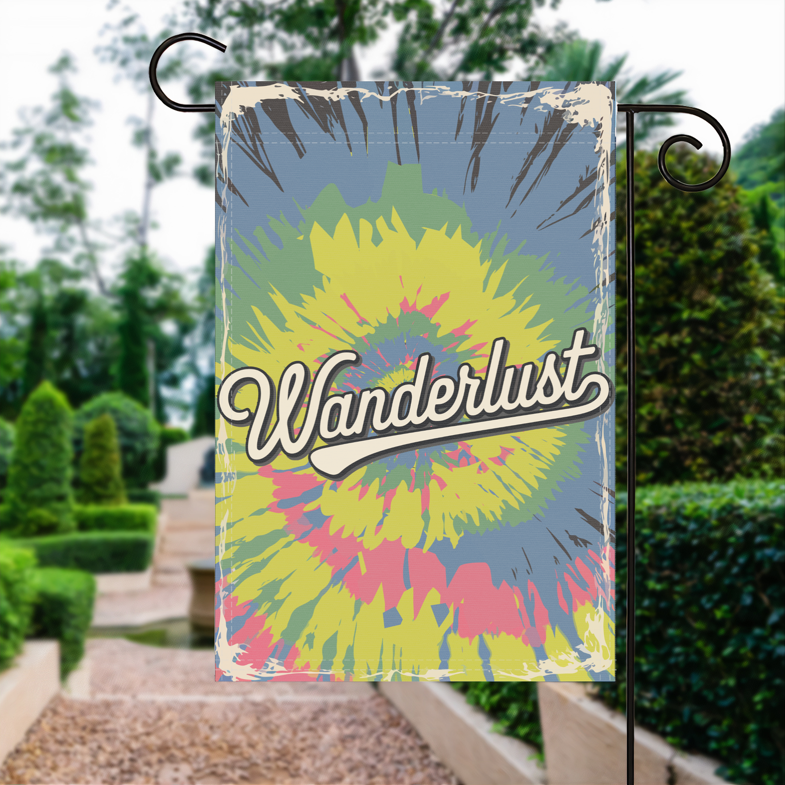 Wanderlust garden flag made of weatherproof polyester displayed in a garden | Bannerfi