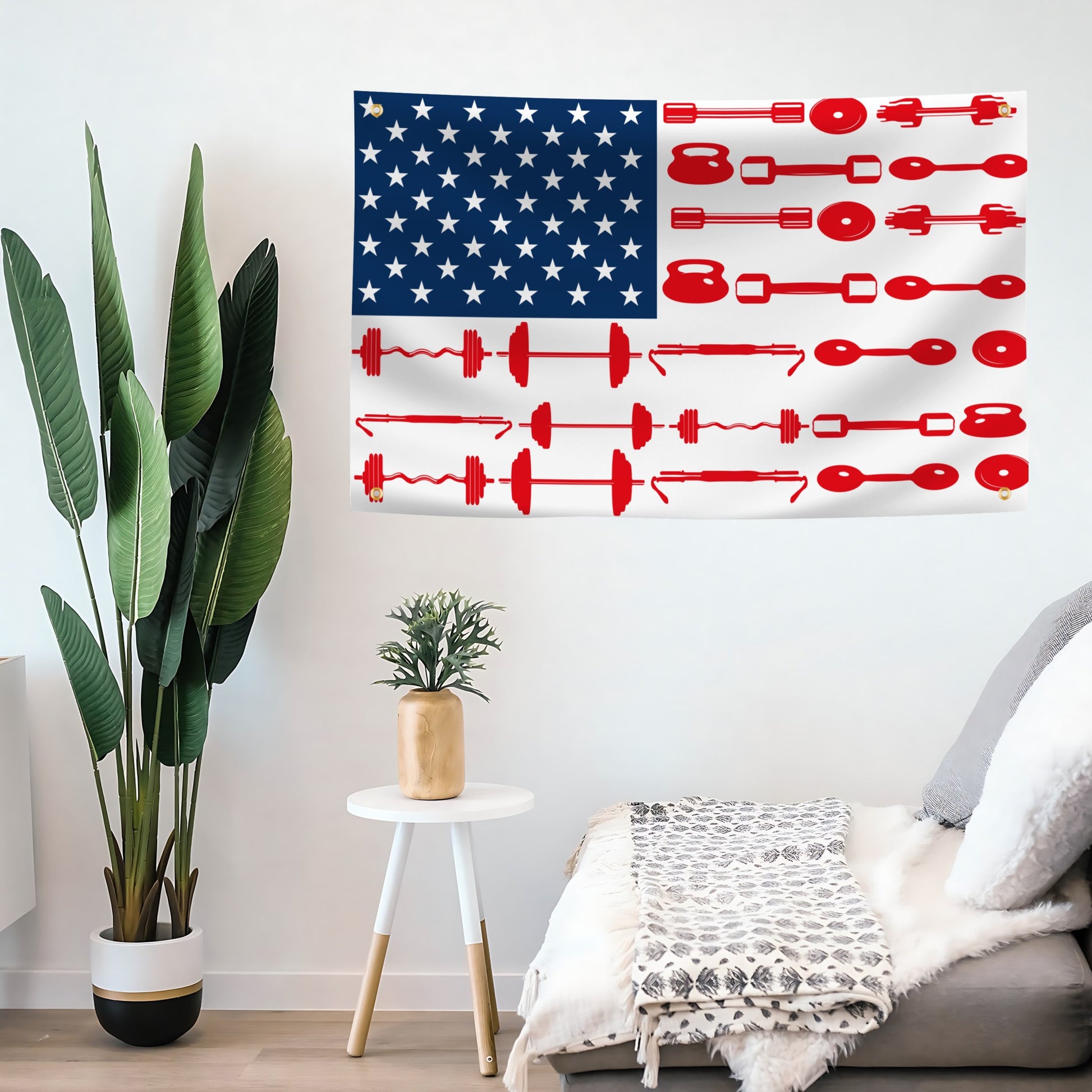 American flag with kettlebell and barbell design on a wall in a room with plants and furniture.