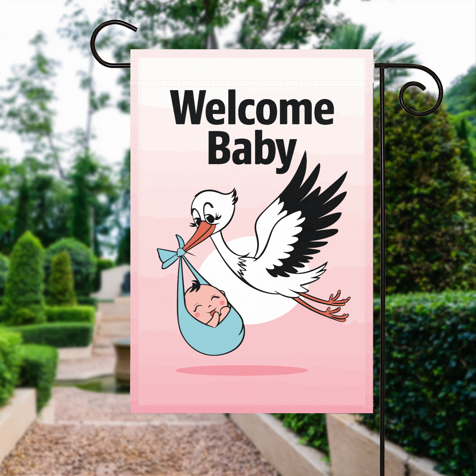 Welcome Baby garden flag made of weatherproof polyester displayed in a garden | Bannerfi