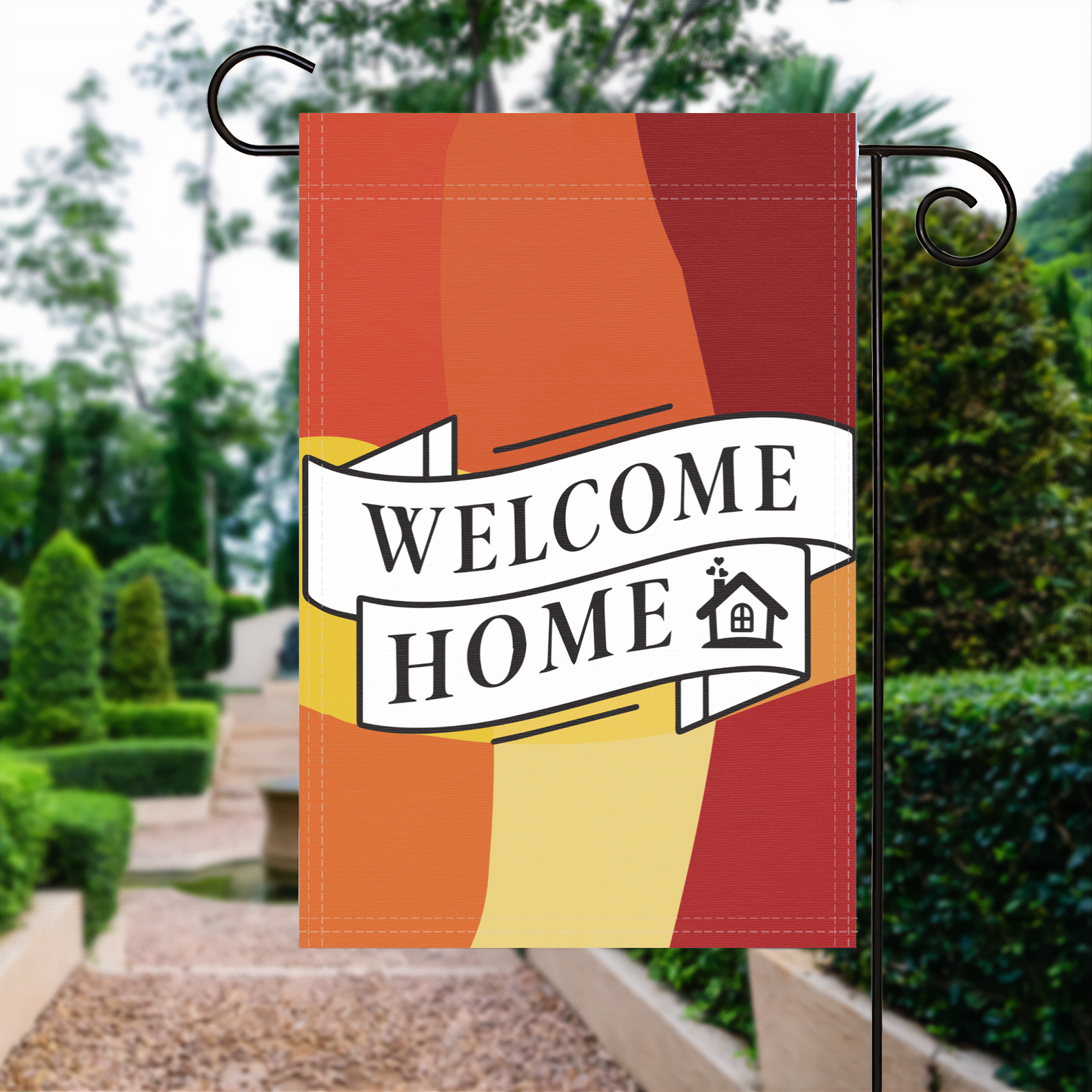 Welcome Home garden flag made of weatherproof polyester displayed in a garden | Bannerfi