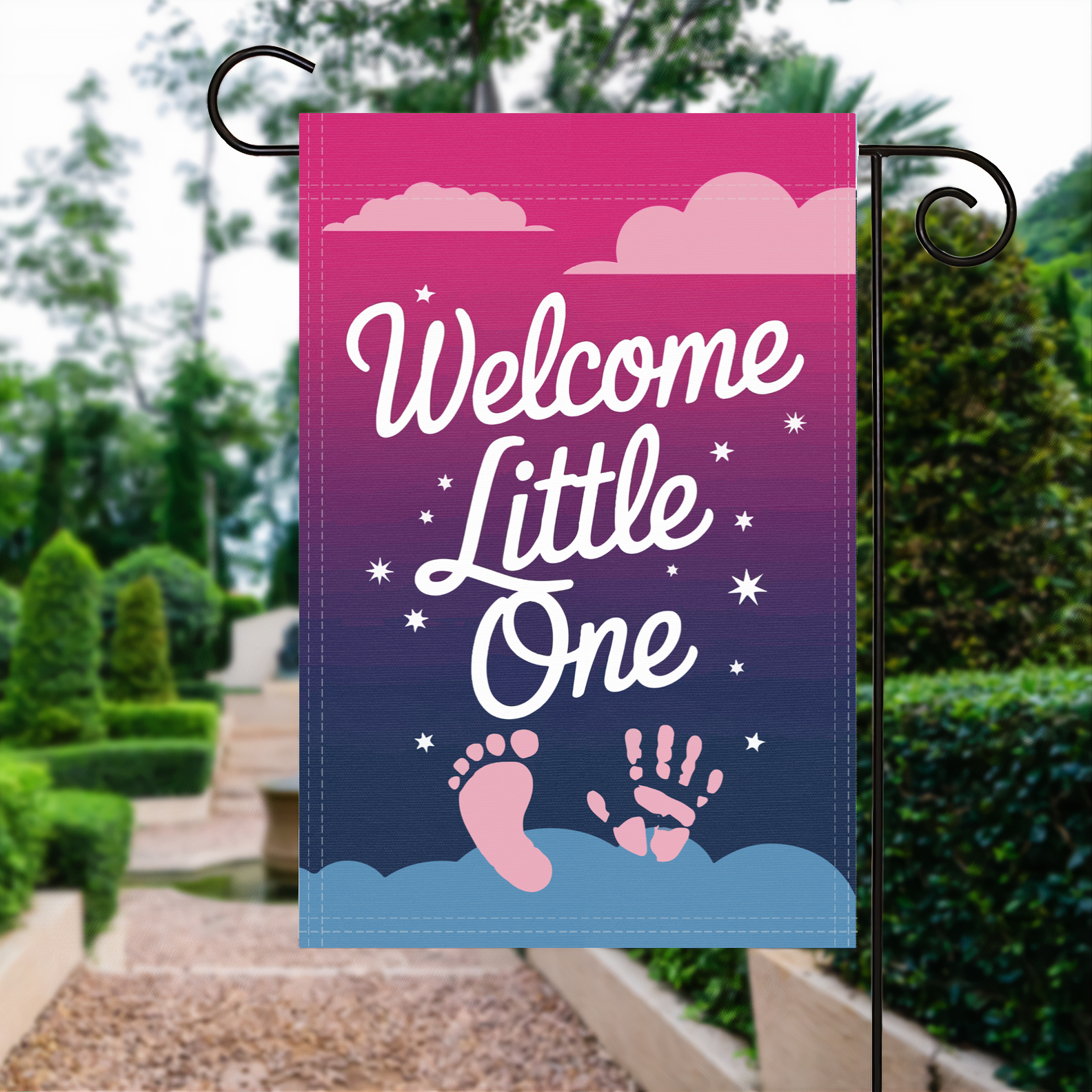 Welcome Little One Baby Prints garden flag made of weatherproof polyester displayed in a garden | Bannerfi
