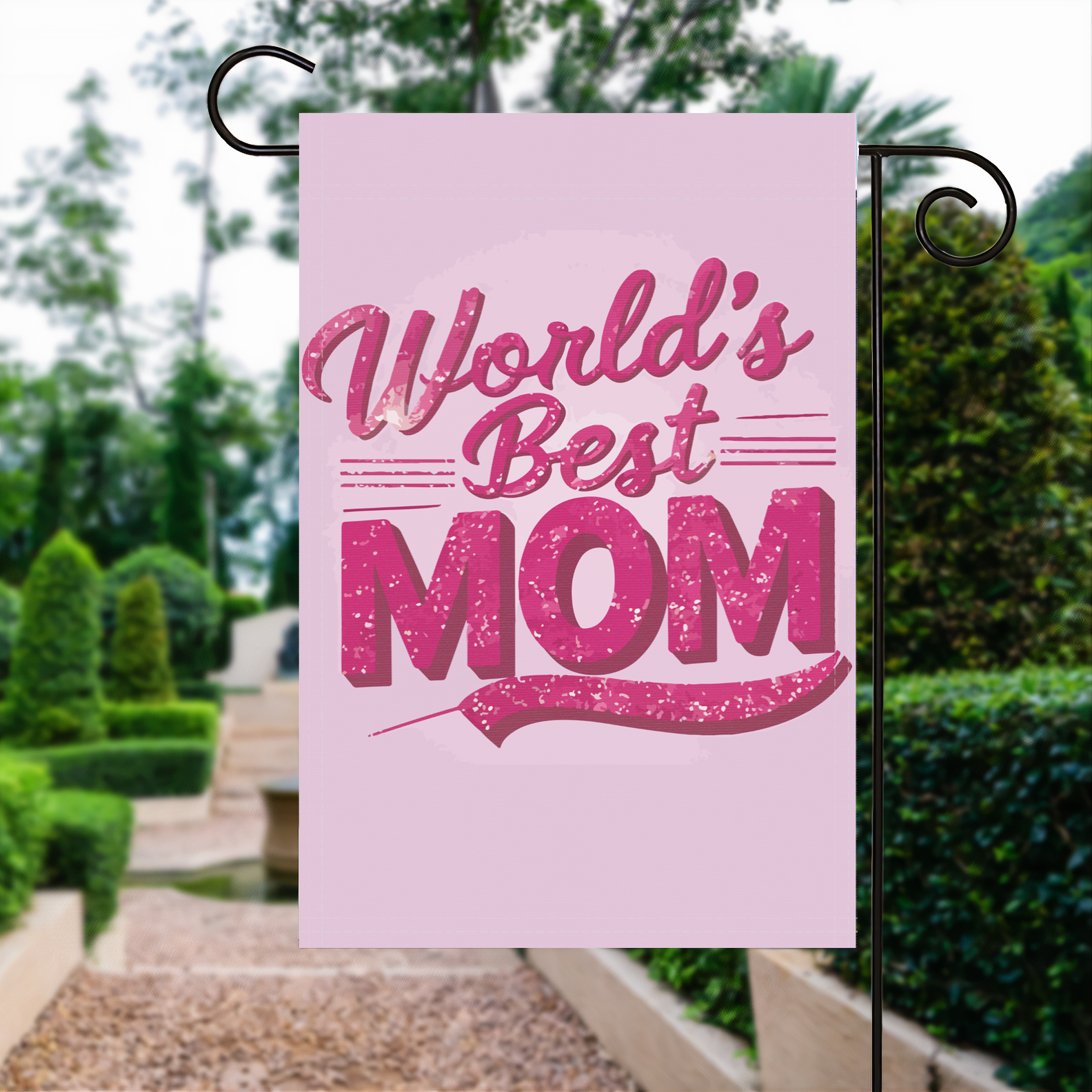 World's Best Mom Pink garden flag made of weatherproof polyester displayed in a garden | Bannerfi