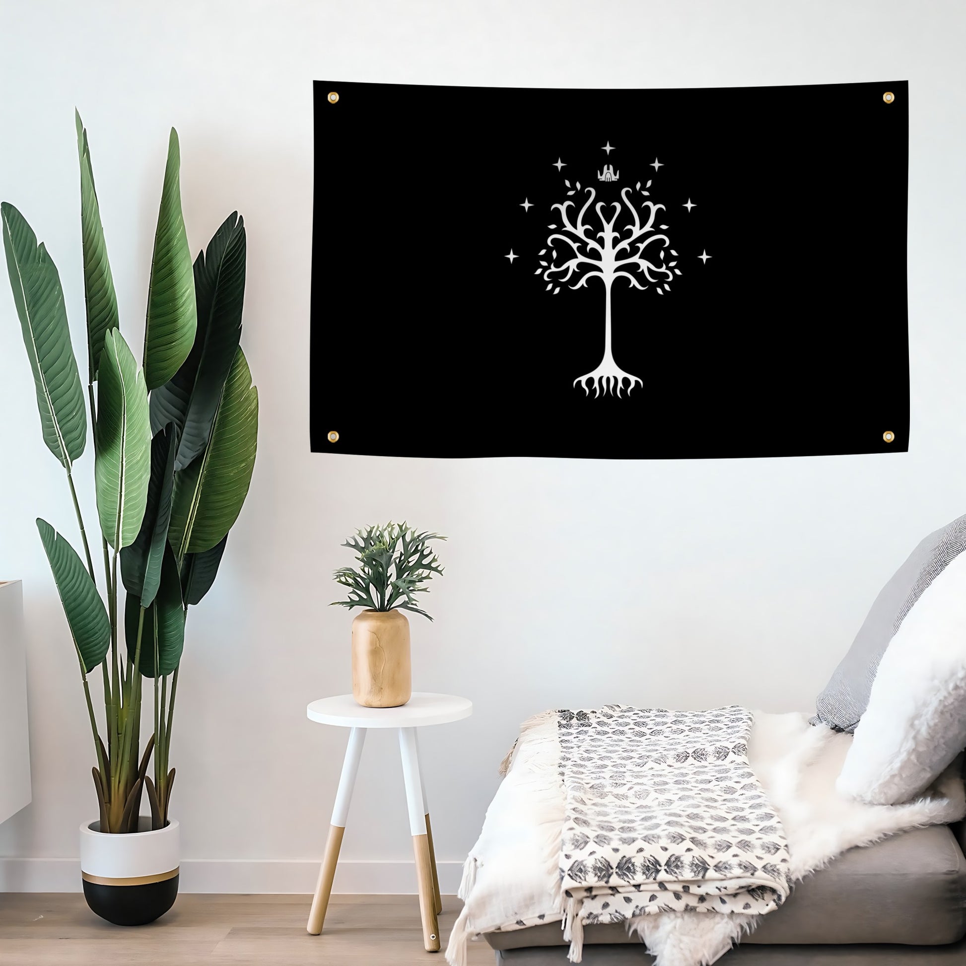 Black flag banner with the LOTR White Tree of Gondor Symbol displayed on a living room wall. 