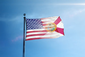 the flag of the united states of america flying in the wind