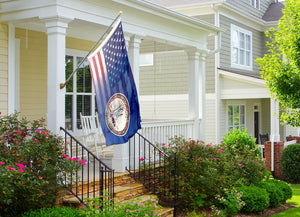 an american flag on a porch of a house