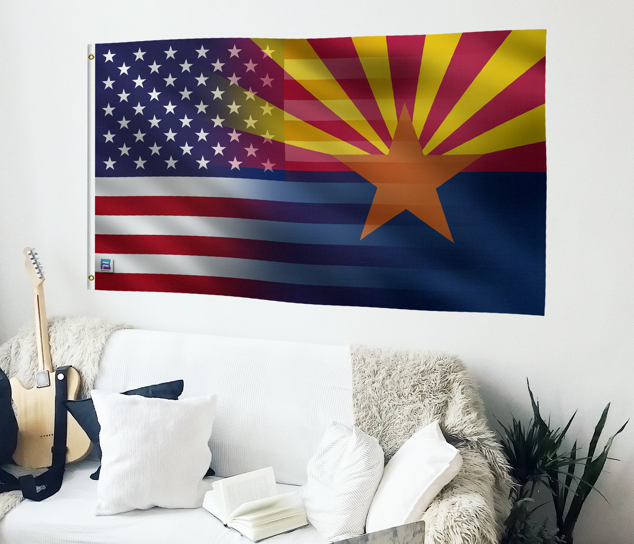 a living room with a white couch and a flag on the wall