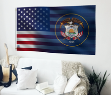 Load image into Gallery viewer, a living room with a guitar and a flag on the wall
