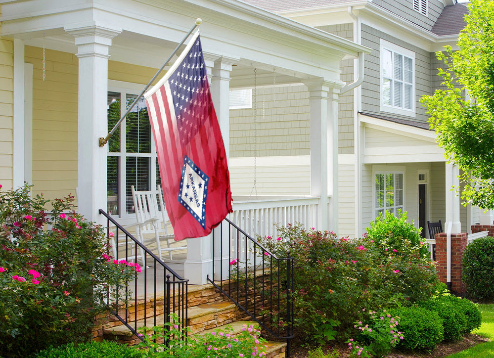 an american flag on a porch of a house