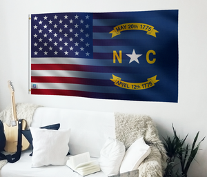 a flag hanging on a wall next to a couch