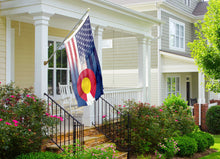 Load image into Gallery viewer, an american and colorado flag on a flagpole in front of a house
