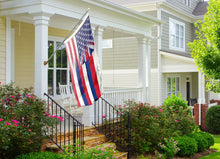 Load image into Gallery viewer, an american flag on a flagpole in front of a house
